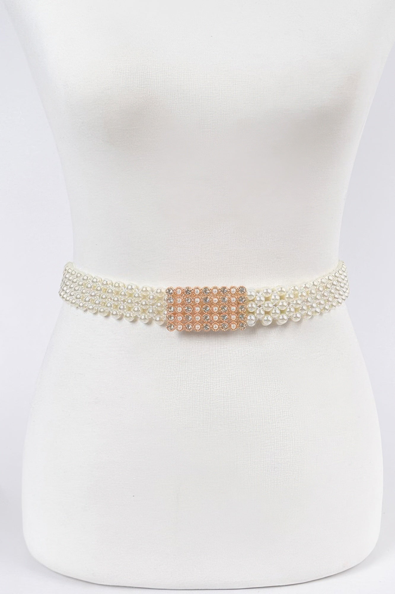 Elastic pearl belt from Toshe Women's Fashions featuring a stretchable design with pearl accents for stylish waistwear.