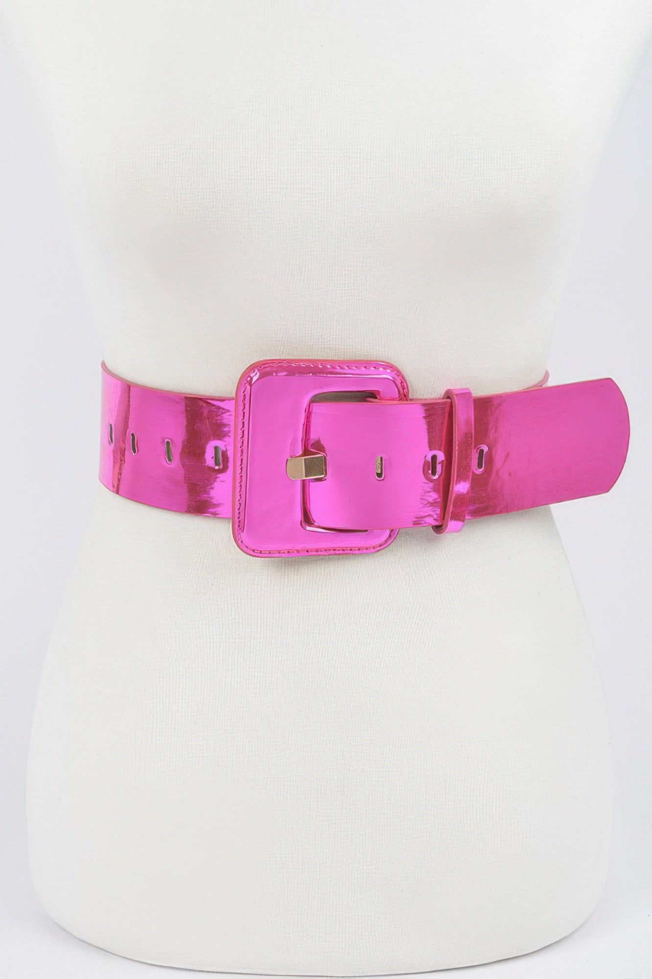 Metallic wide belt from Toshe Women's Fashions featuring a shiny silver finish and adjustable strap, styled for modern outfits.