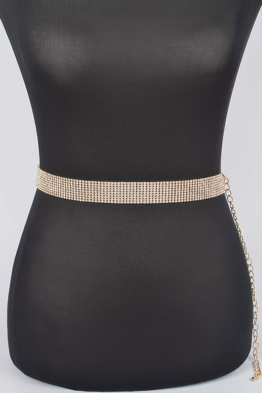 Shiny rhinestone belt from Toshe Women's Fashions with sparkling embellishments and a sleek design for stylish outfits.