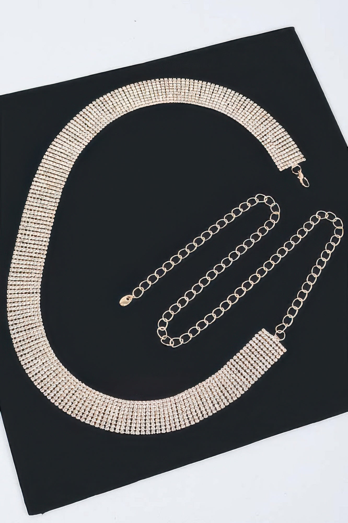 Shiny rhinestone belt from Toshe Women's Fashions featuring sparkling embellishments and a sleek design.