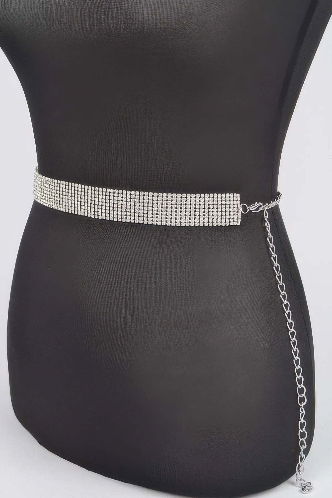 Shiny rhinestone belt from Toshe Women's Fashions with sparkling embellishments and adjustable strap.
