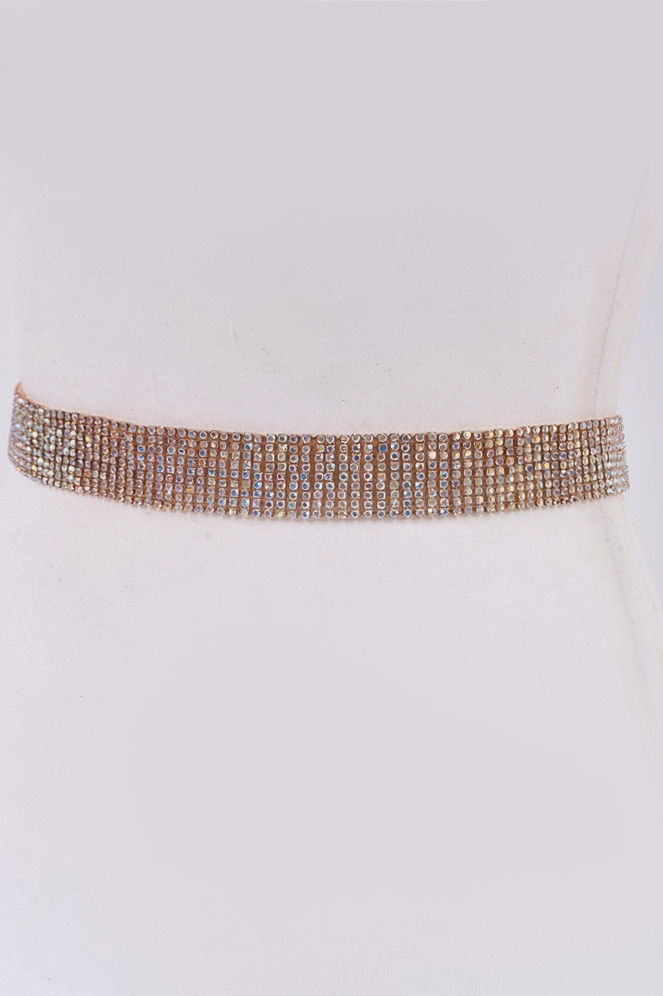 Shiny rhinestone belt from Toshe Women's Fashions with sparkling stones and sleek design, perfect for stylish outfits.