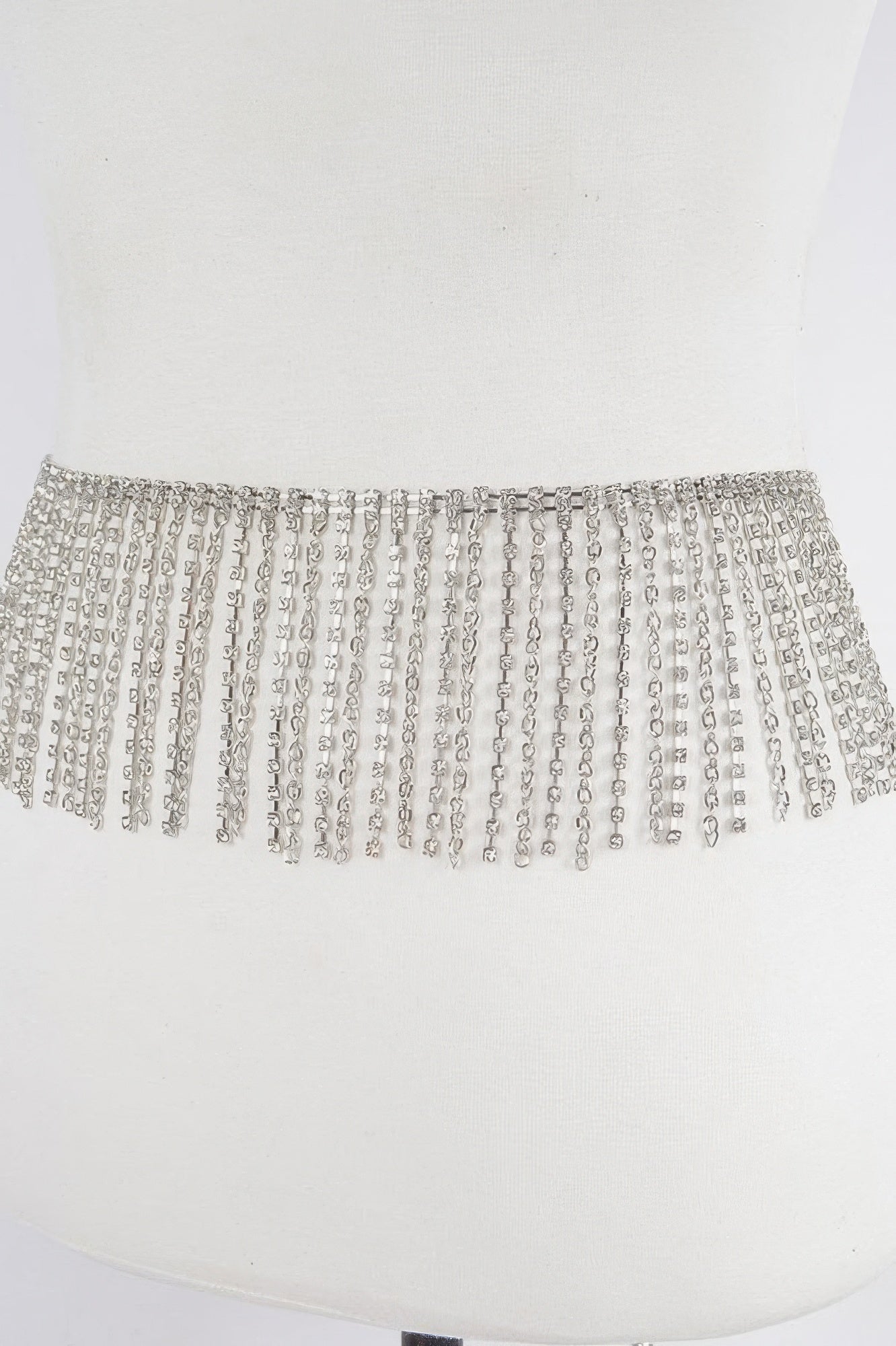Sparkling rhinestone curtain belt from Toshe Women's Fashions featuring shimmering stones and elegant design.