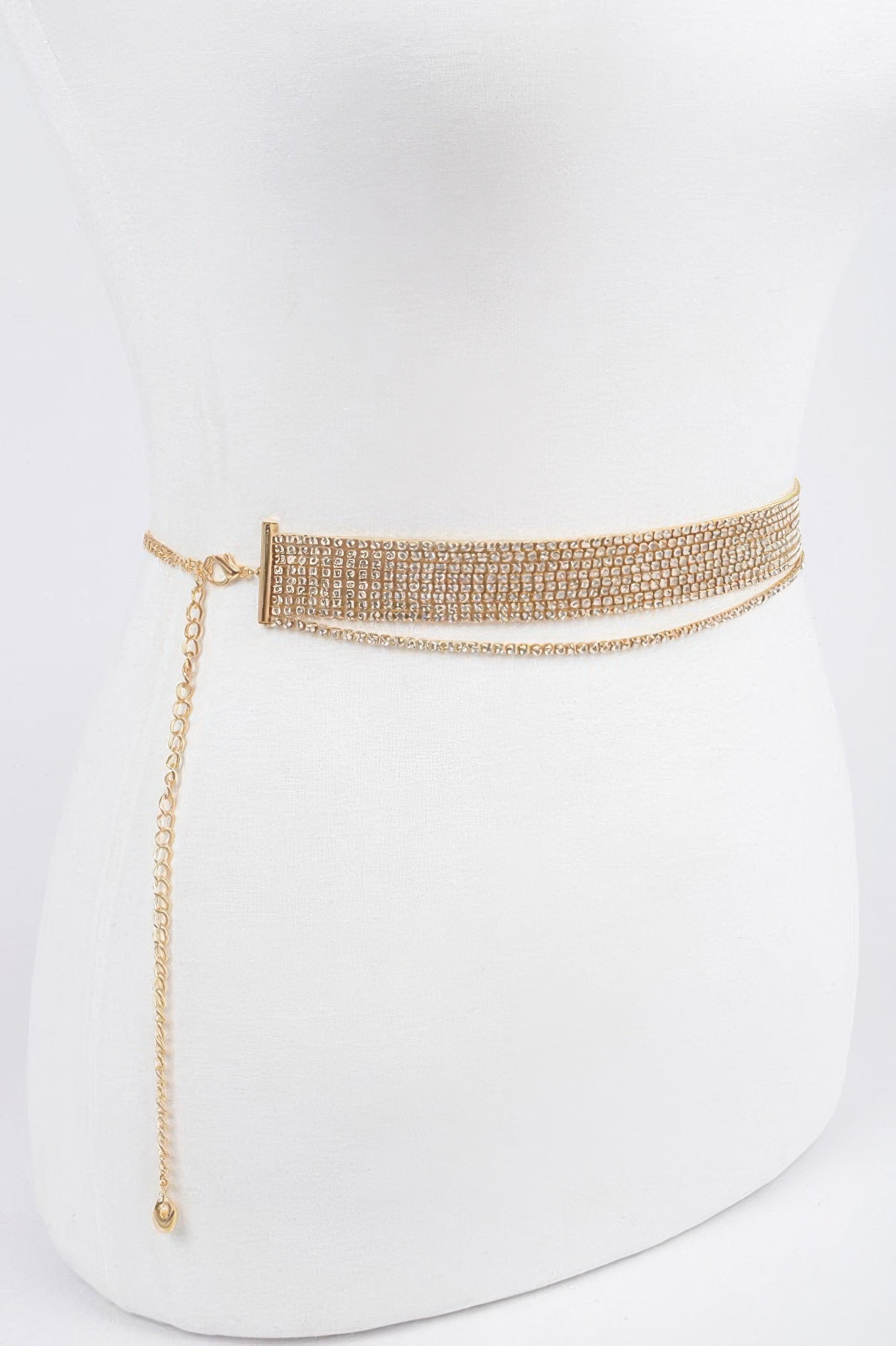 Gold draped wrap belt from Toshe Women's Fashions, showcasing elegant fabric and stylish design for women.
