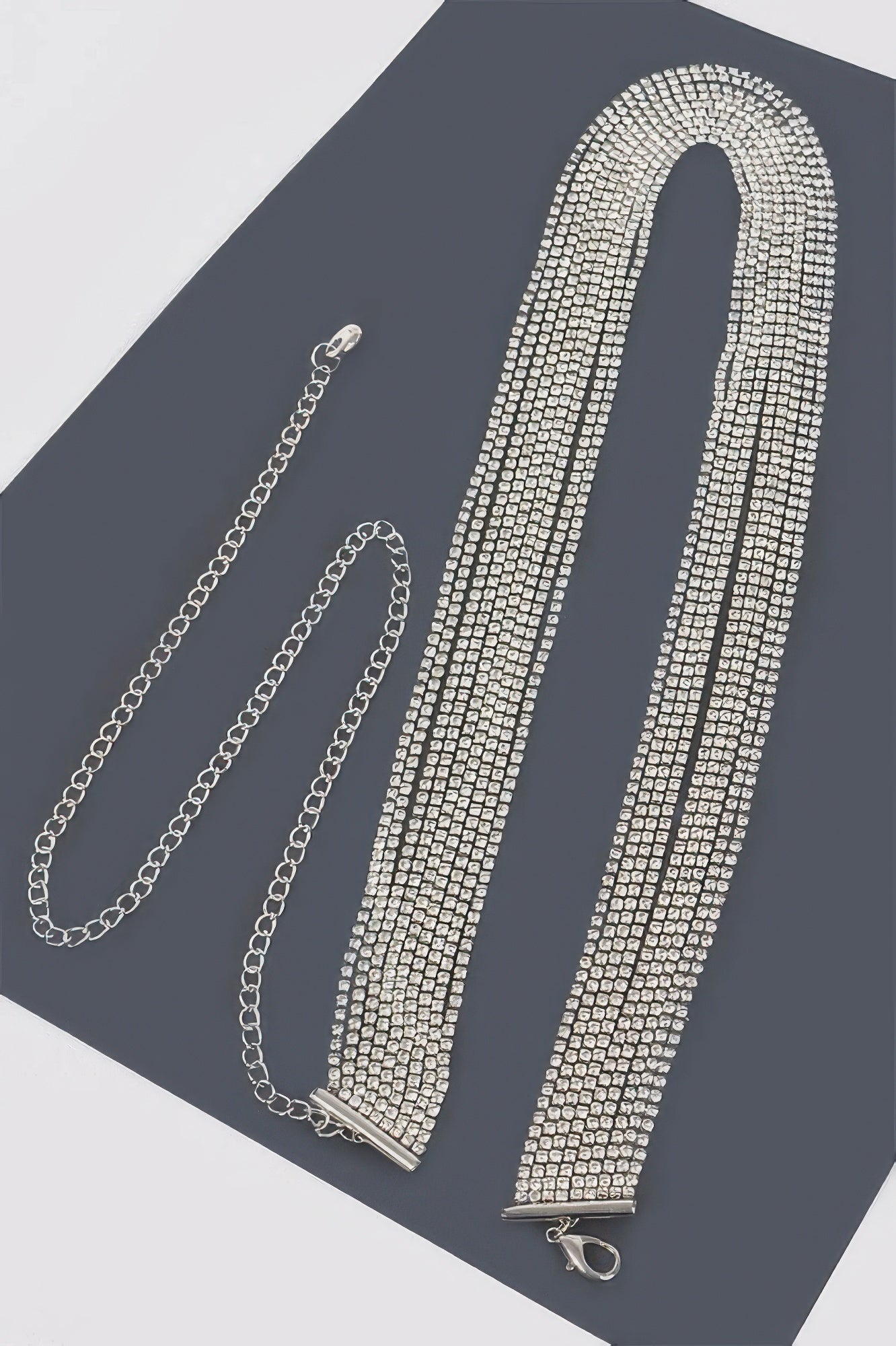 Gold draped wrap belt from Toshe Women's Fashions, featuring elegant fabric and stylish design for accessorizing outfits.