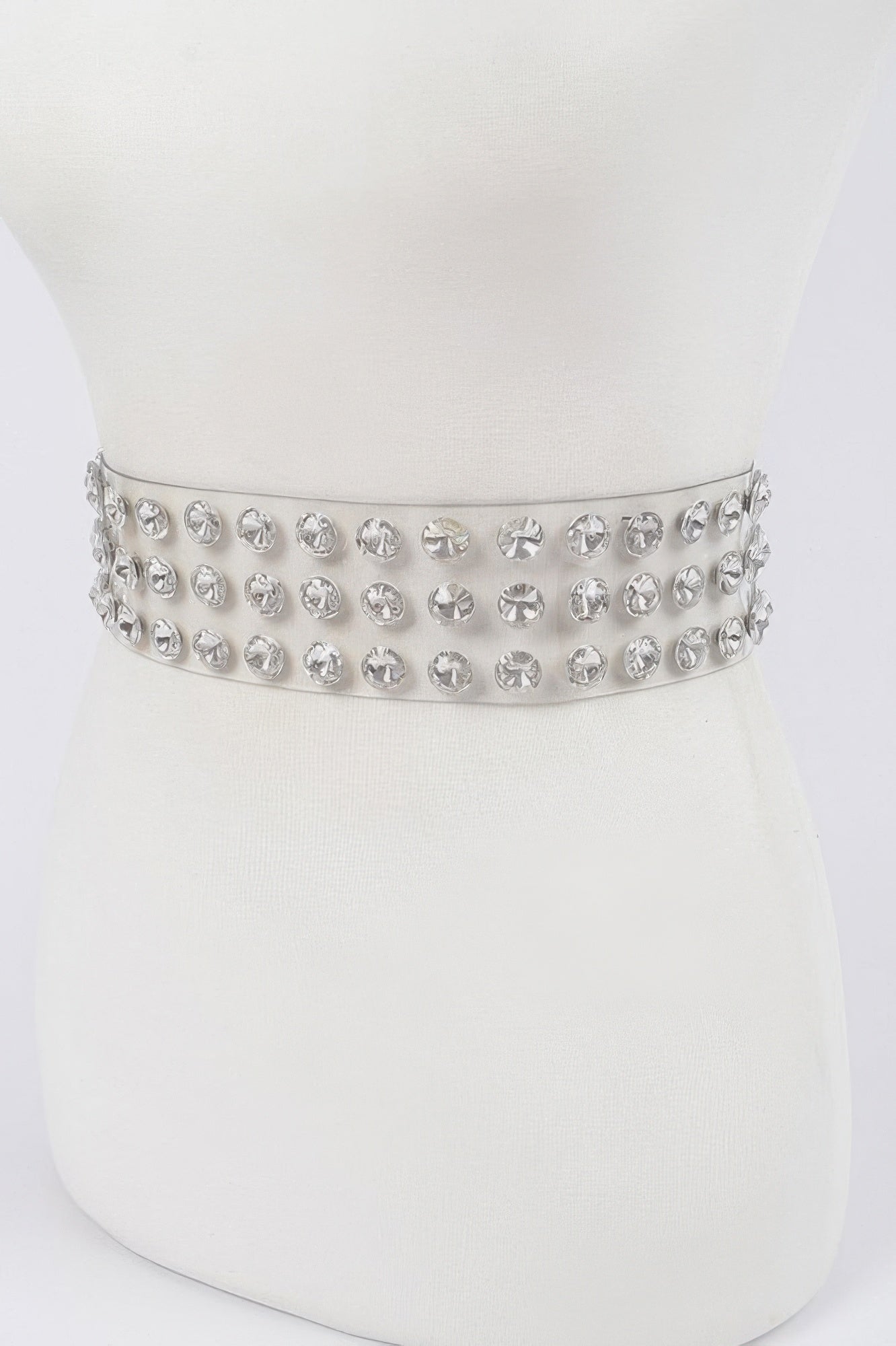 Large clear stone waist belt by Toshe Women's Fashions featuring multi-sized stones for a stylish accessory.