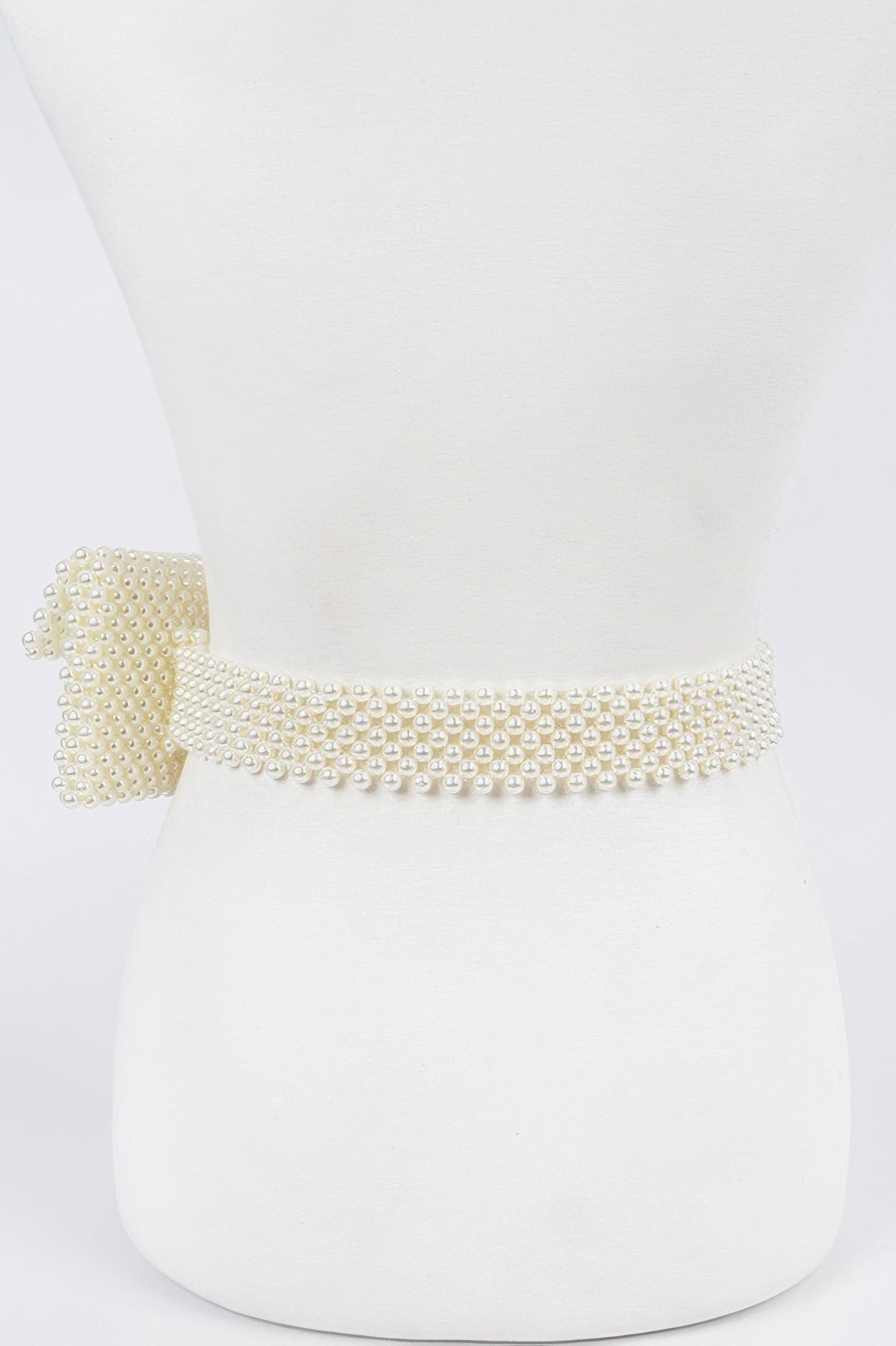 Handmade faux pearl belt bag with adjustable strap and elegant design, perfect for stylish women's fashion accessories.