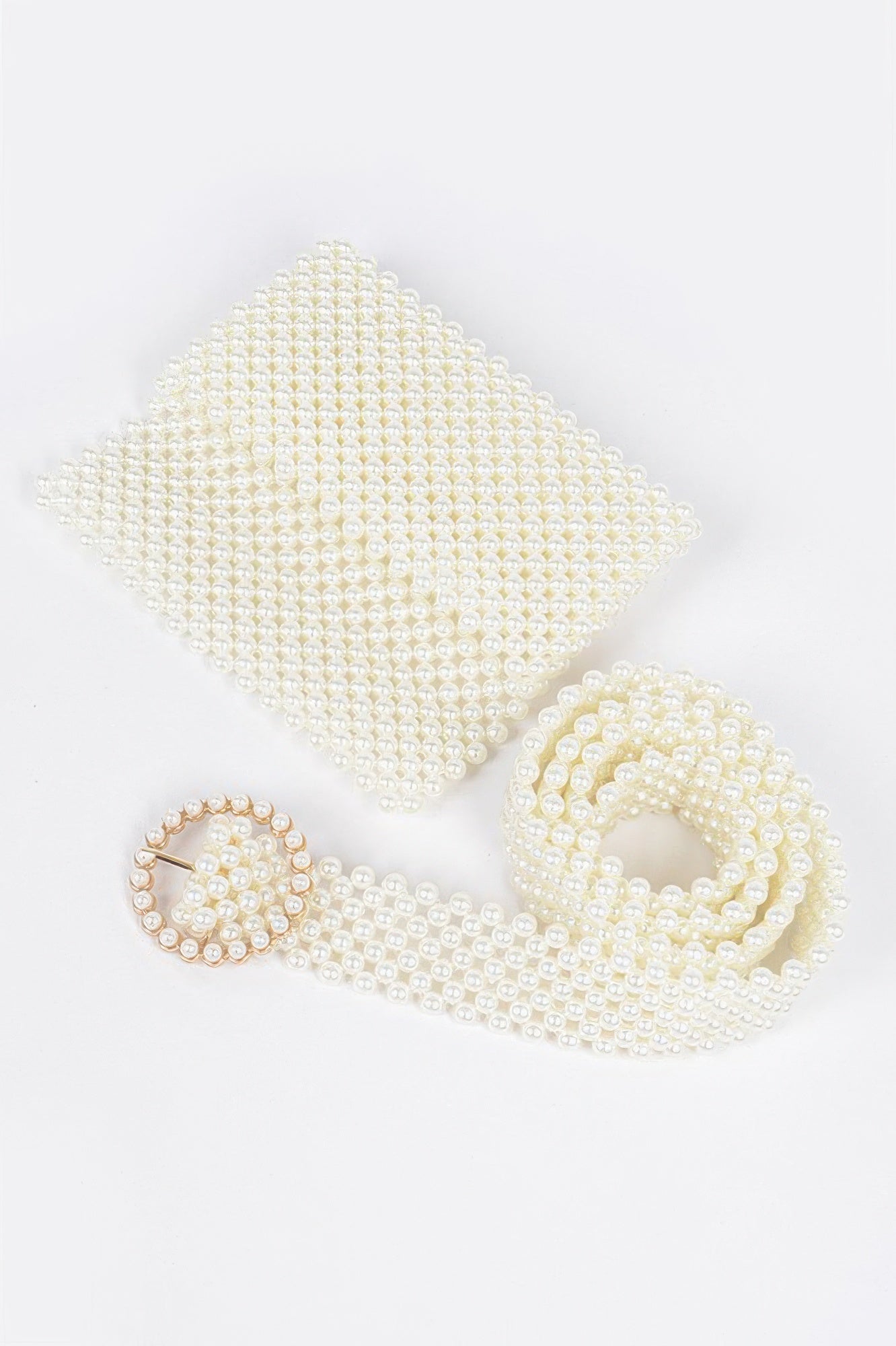 Handmade faux pearl belt bag with gold chain strap, stylish accessory for women by Toshe Women's Fashions.