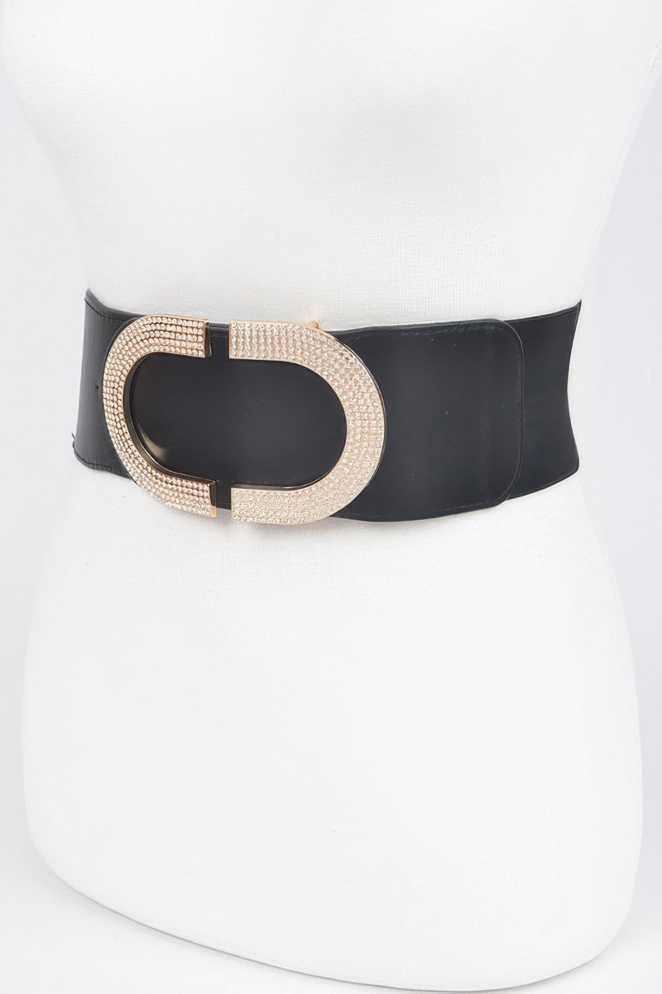 Rhinestone buckle stretch belt from Toshe Women's Fashions with a sparkling rhinestone-encrusted buckle and elastic strap.