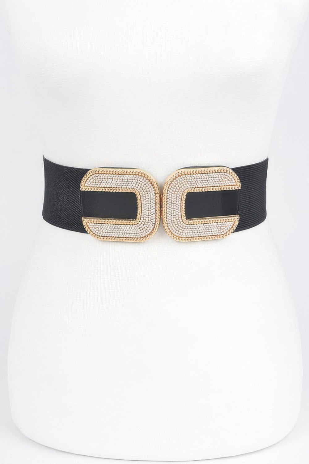 Rhinestone C-buckle stretch belt by Toshe Women's Fashions with sparkling rhinestones and a sleek C-shaped buckle.