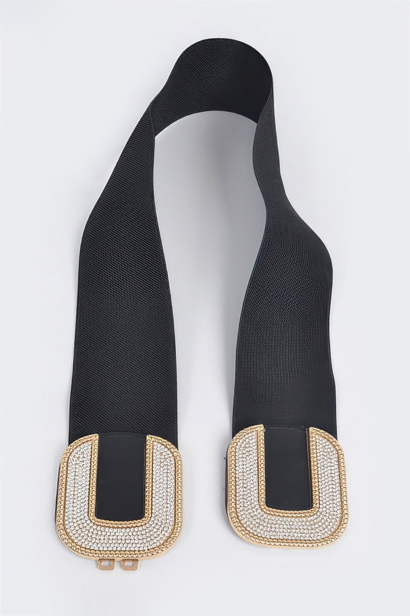 Rhinestone C-buckle stretch belt by Toshe Women's Fashions featuring sparkling rhinestones and a sleek C-shaped buckle.