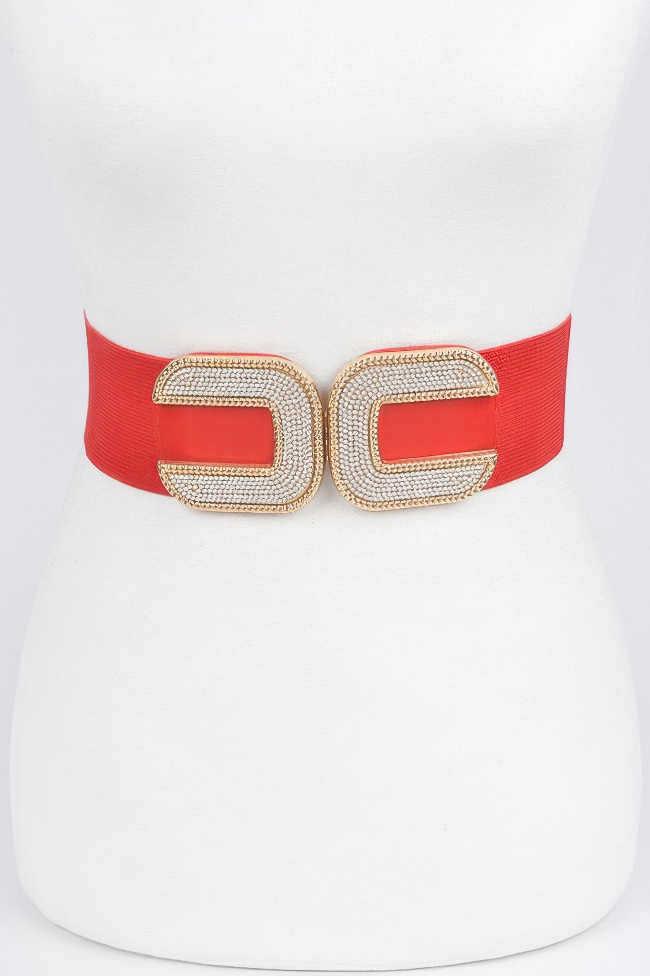 Rhinestone C-buckle stretch belt by Toshe Women's Fashions featuring sparkling rhinestones and a sleek C-shaped buckle.
