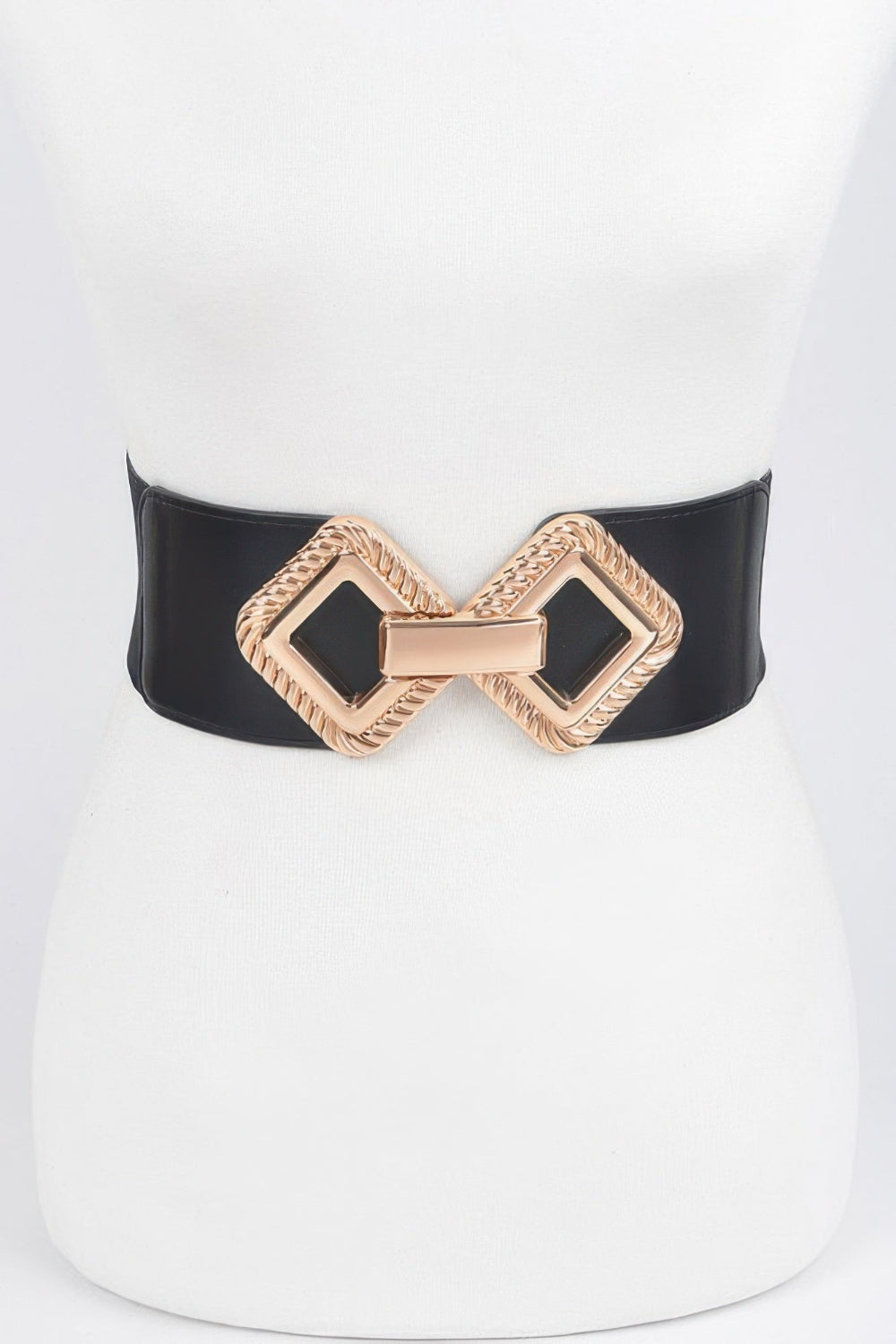 Big metal buckle stretch belt by Toshe Women's Fashions, featuring a sleek design with a prominent metal buckle and adjustable stretch fit.