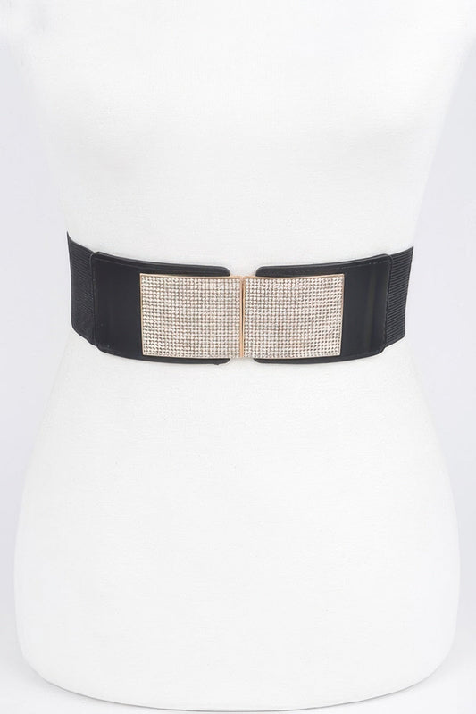 Shiny rhinestone metal buckle on a stretch belt from Toshe Women's Fashions, showcasing its decorative design and adjustable fit.