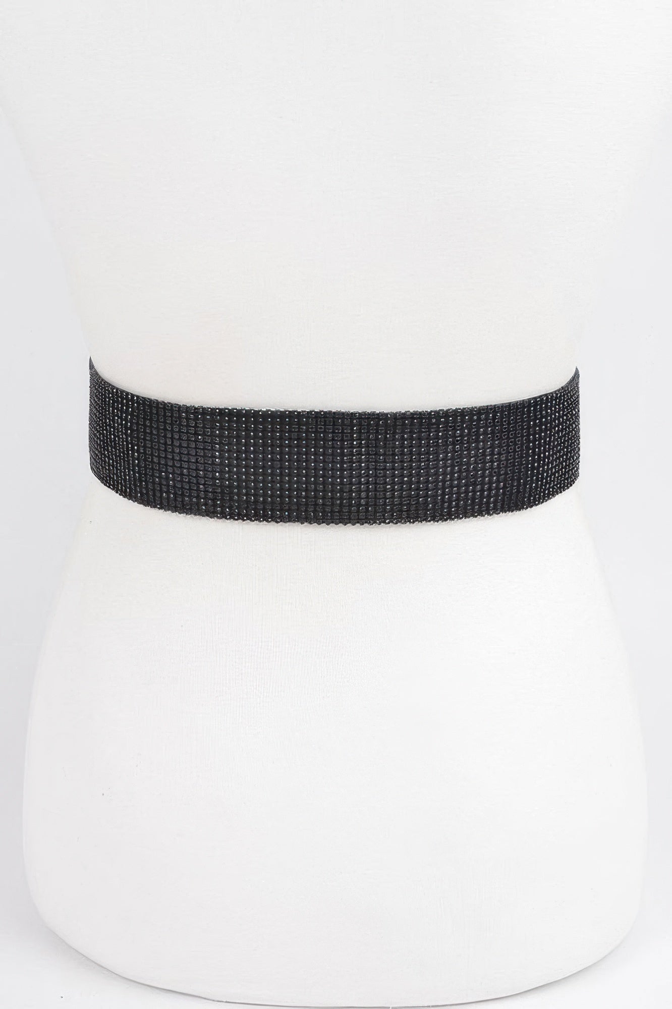 Black stretch rhinestone belt from Toshe Women's Fashions with sparkling rhinestones and a flexible fit.