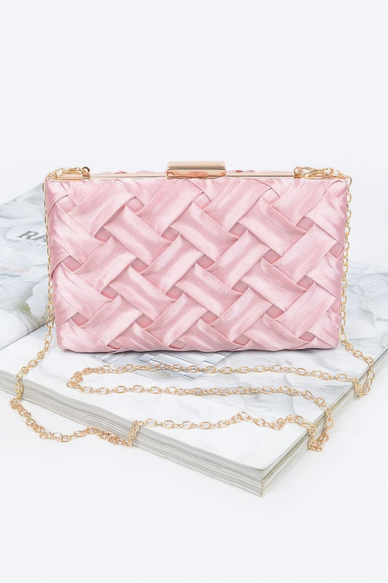 Cross hatched chain clutch bag by Toshe Women's Fashions, featuring a stylish design and metallic chain strap.