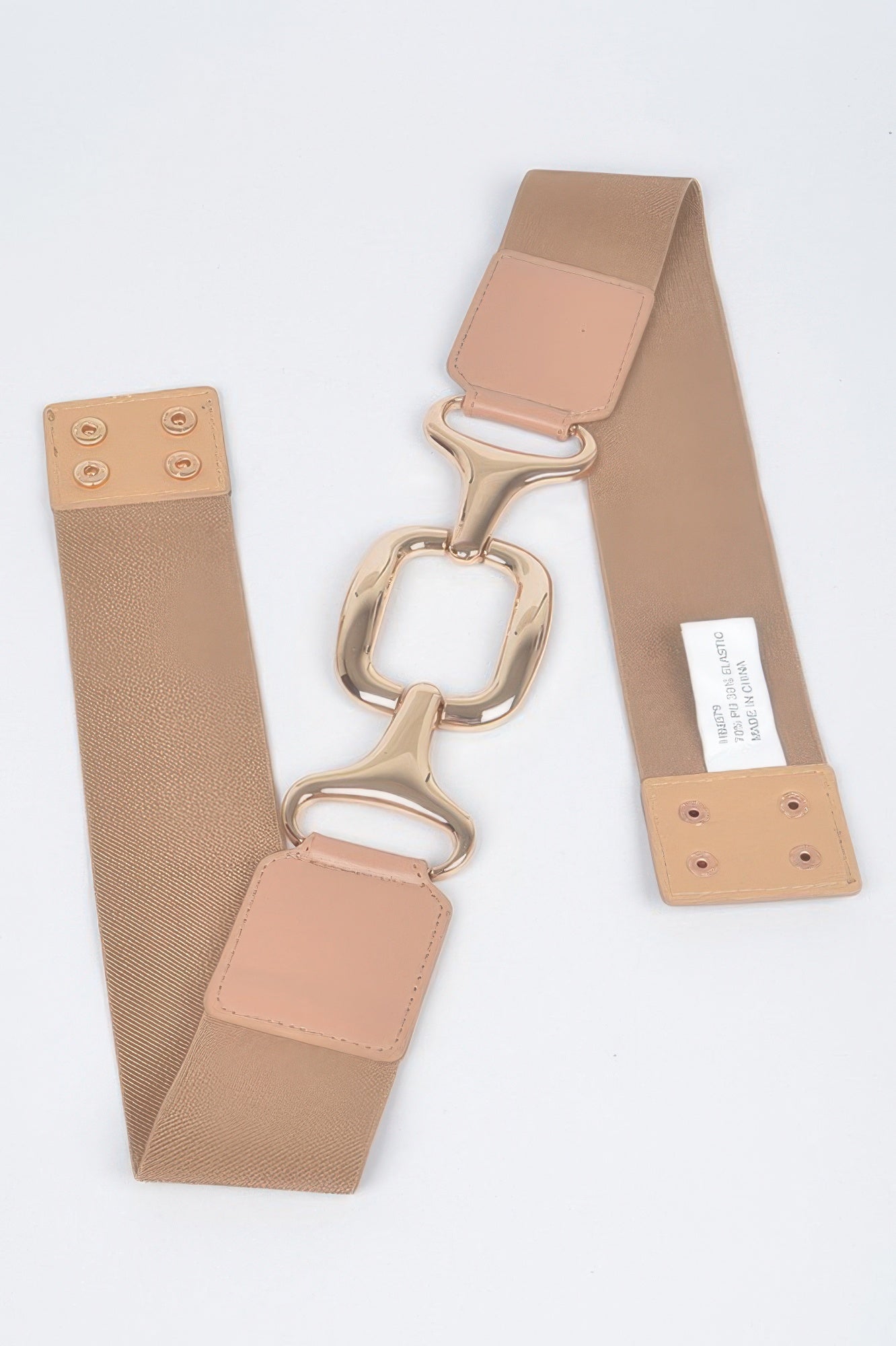 Multi metal buckle stretch belt by Toshe Women's Fashions featuring a sleek design and adjustable fit.