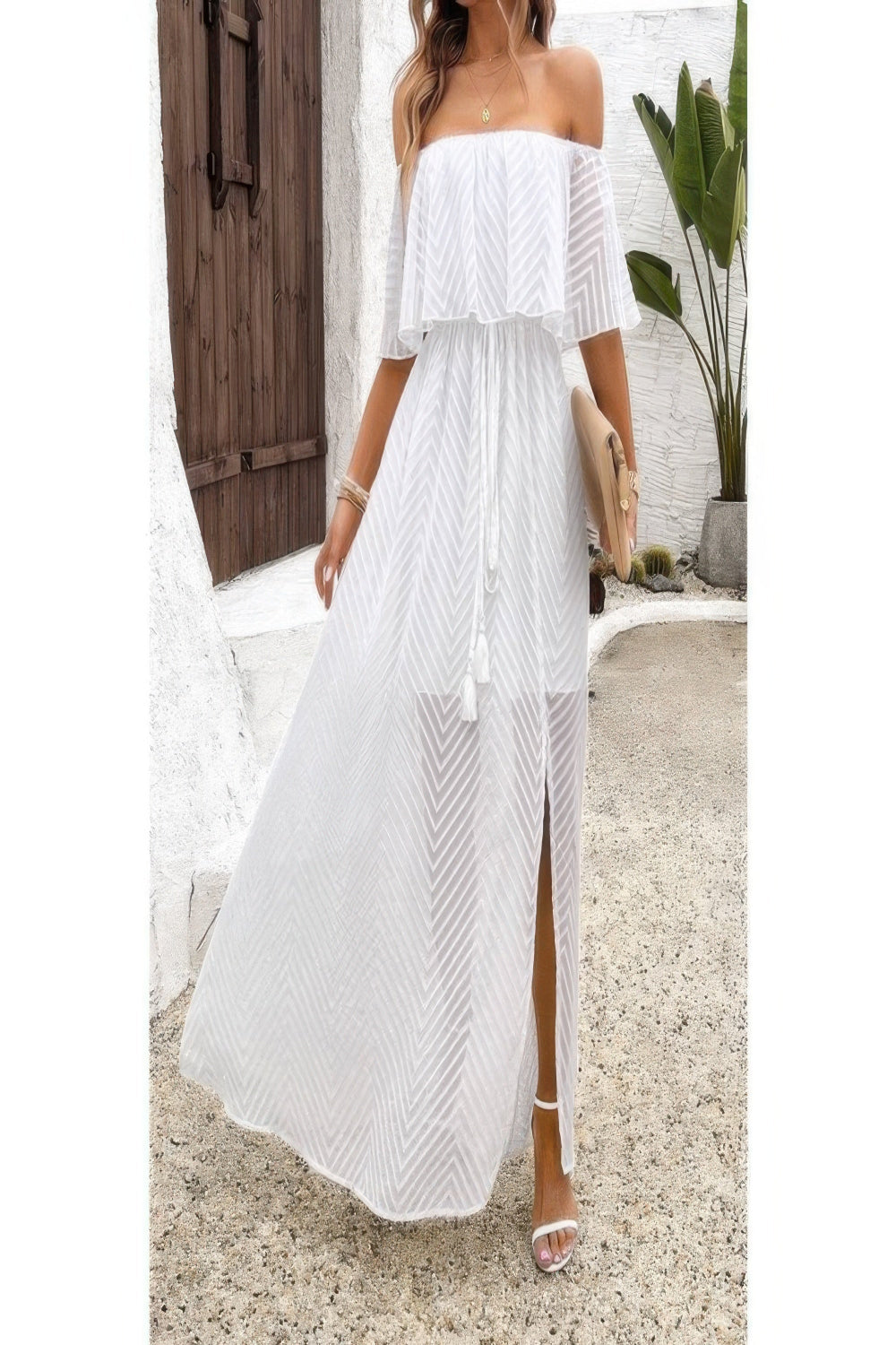 Off-shoulder tassel ruffle trim split dress by Toshe Women's Fashions, featuring flowing fabric and stylish design.