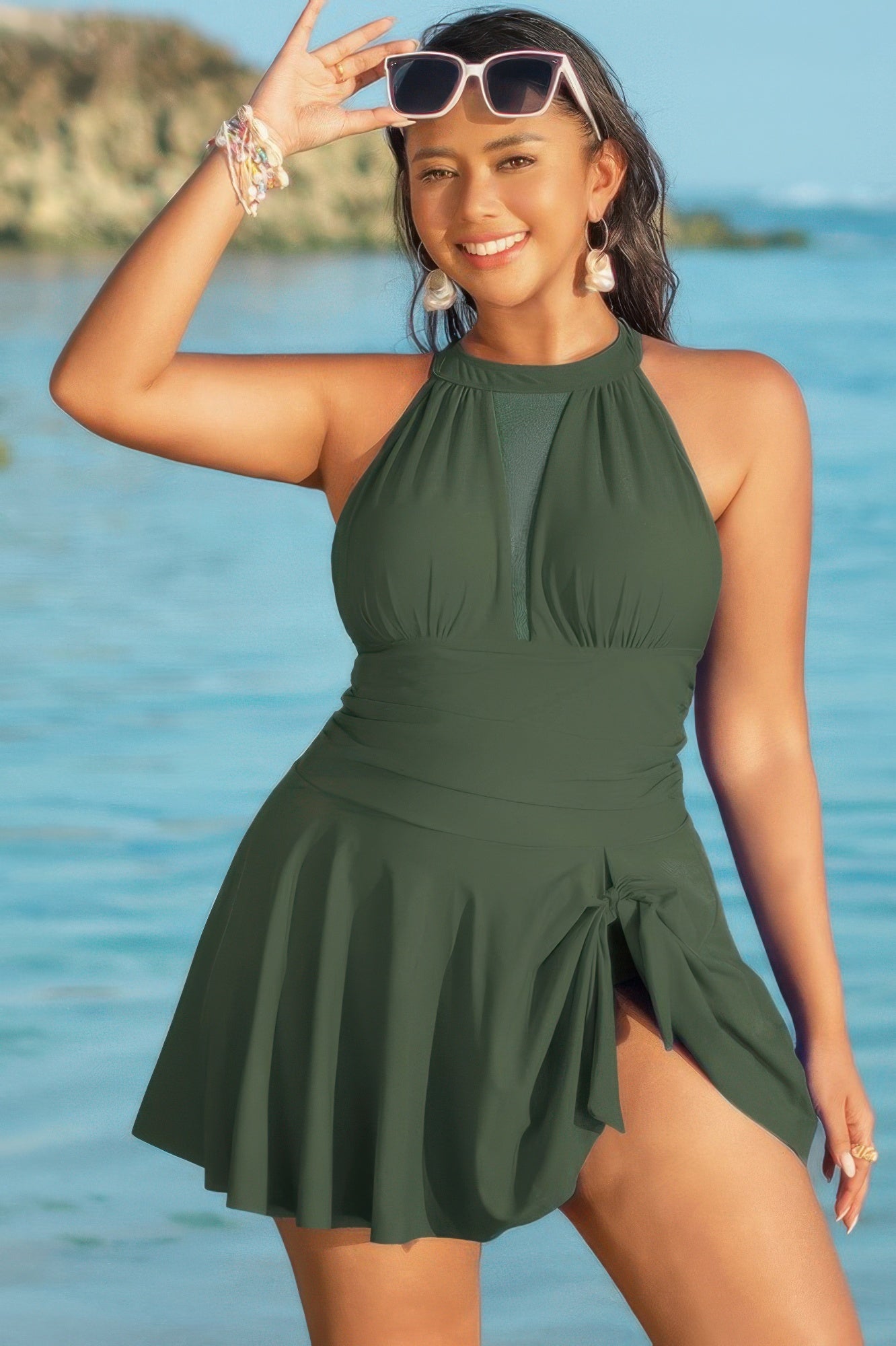 Halter ruched sleeveless swim dress by Toshe Women's Fashions, featuring a fitted design and adjustable halter neckline.