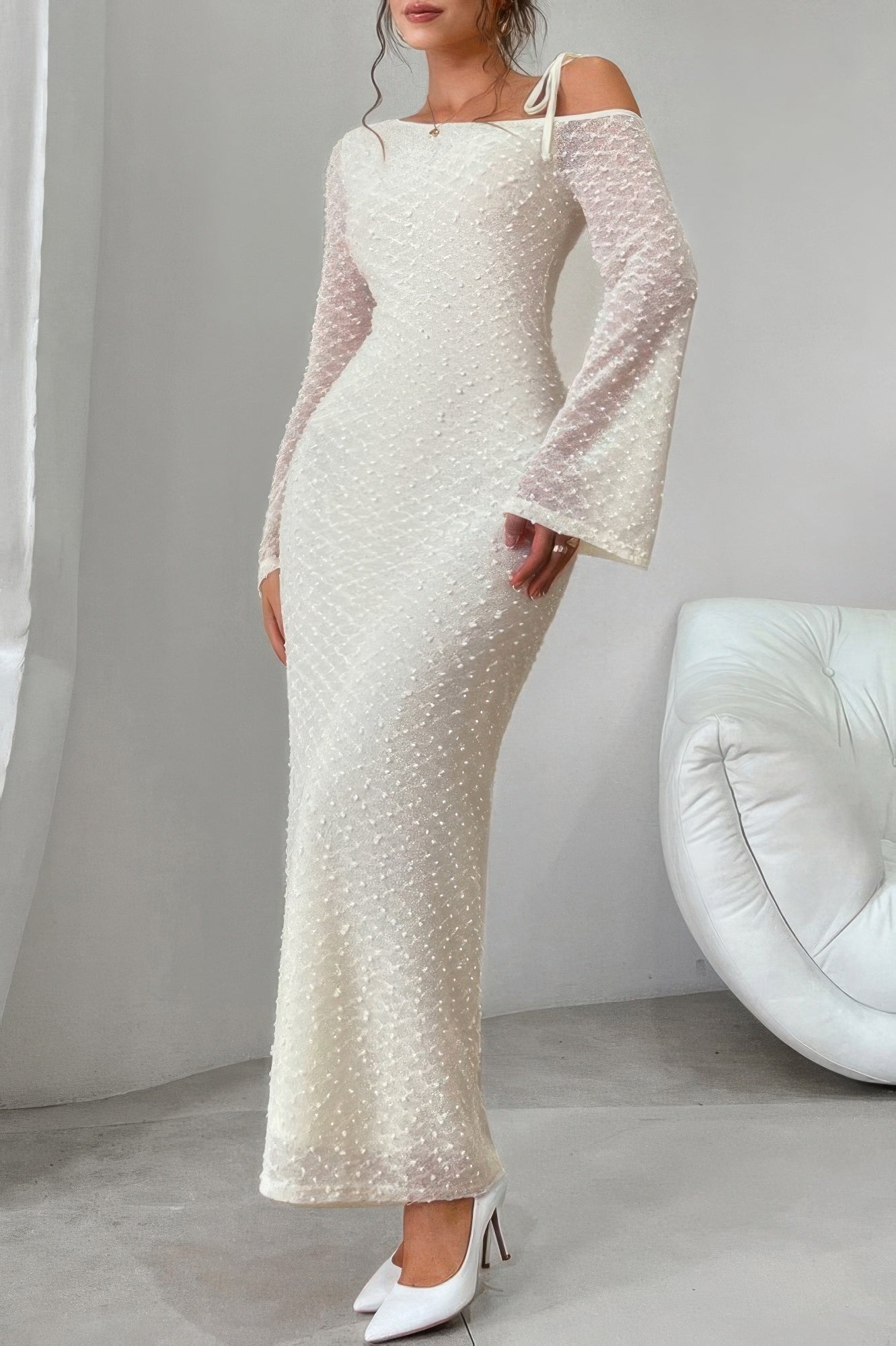 Toshe Women's Fashions one shoulder bodycon long sleeve dress shown on a model, fitted silhouette with elegant design.