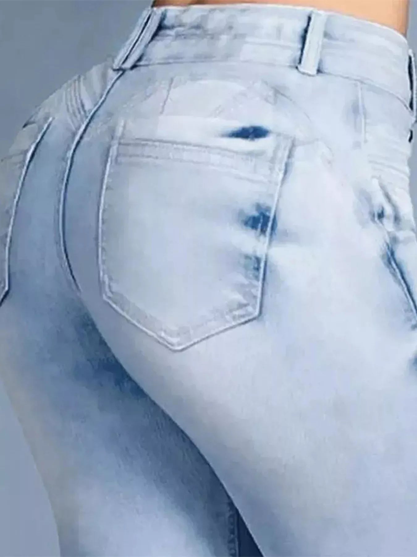 High-waisted flare jeans from Trendsi, featuring a classic denim look with a fitted waist and wide-leg bottom.
