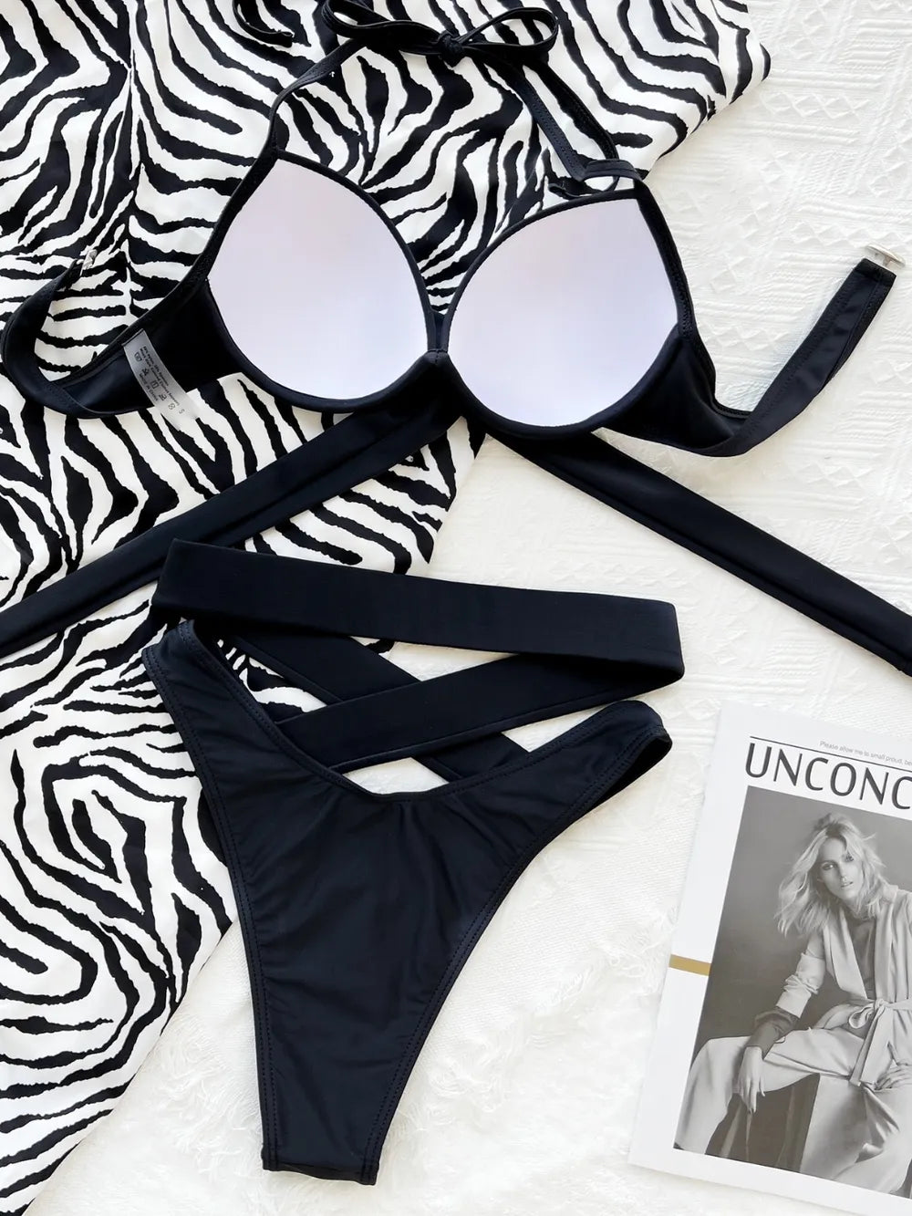 Crisscross halter neck bikini set from Trendsi featuring a stylish swimwear design with adjustable straps and vibrant colors.