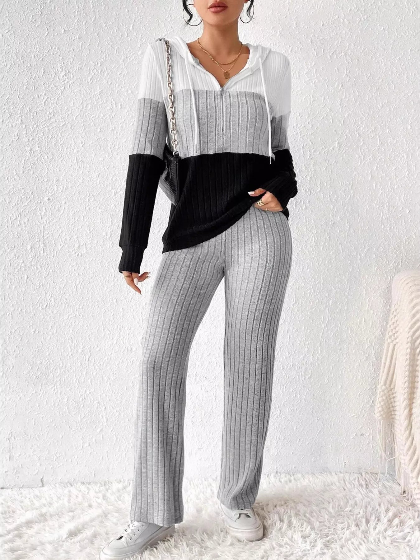 Color block half zip hooded top and pants set by Trendsi, featuring a stylish color-block design and comfortable fit.