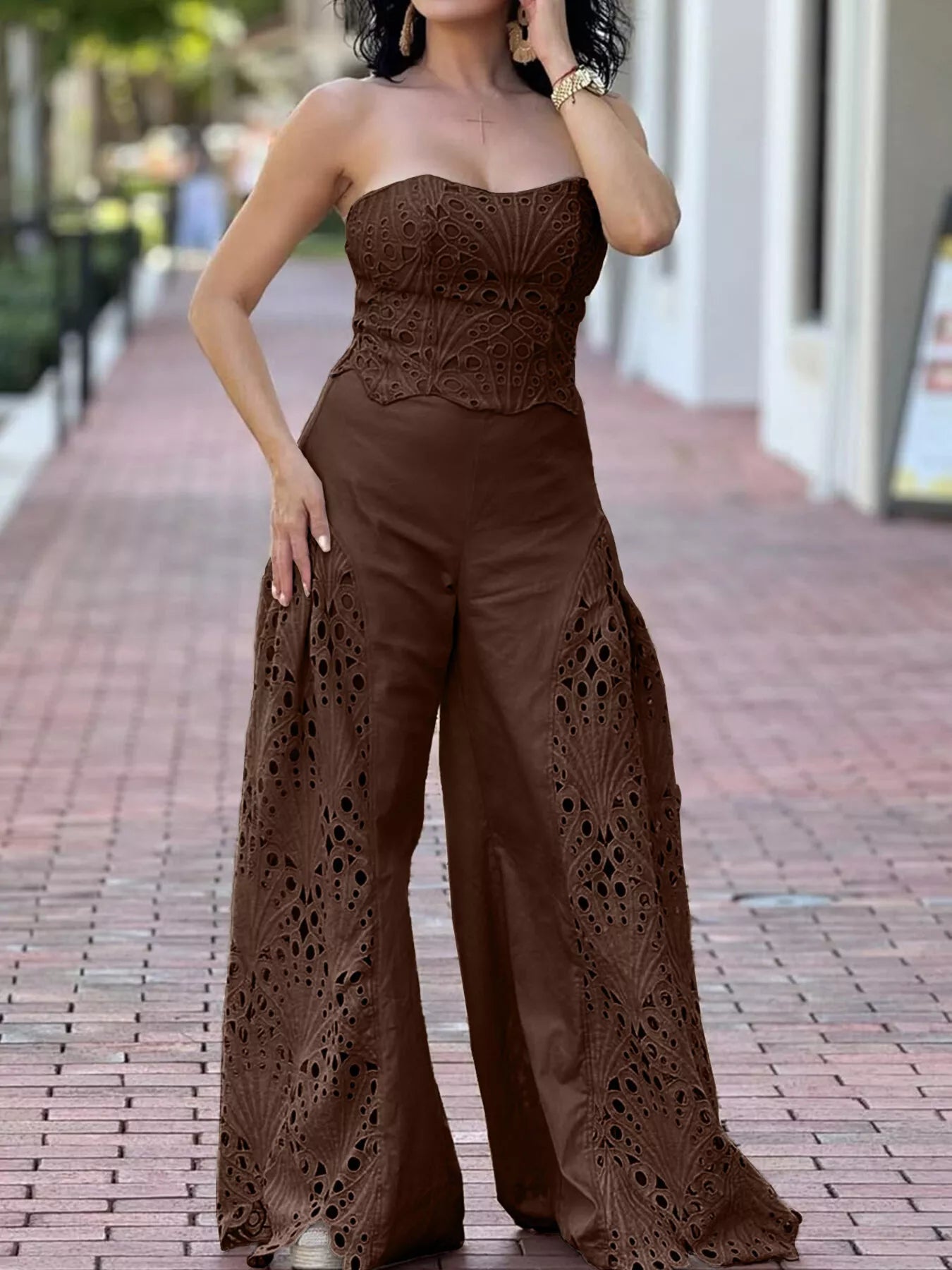 Hollow-out tube top and matching pants set by Trendsi, stylish 2-piece fashion ensemble with cut-out design and modern fit.