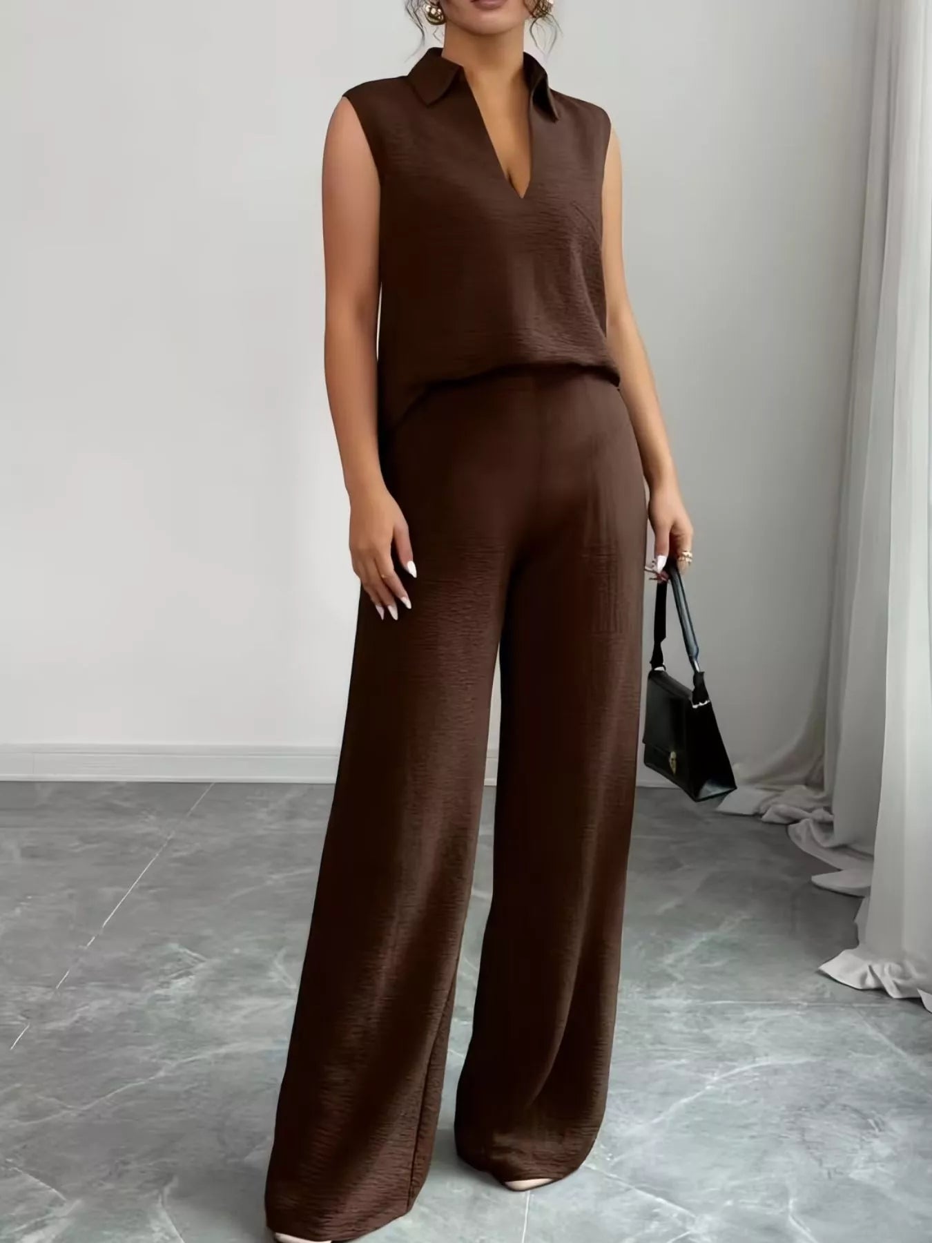 V-neck sleeveless top and wide-leg pants set by Trendsi, featuring a relaxed fit and lightweight fabric, shown on a model.