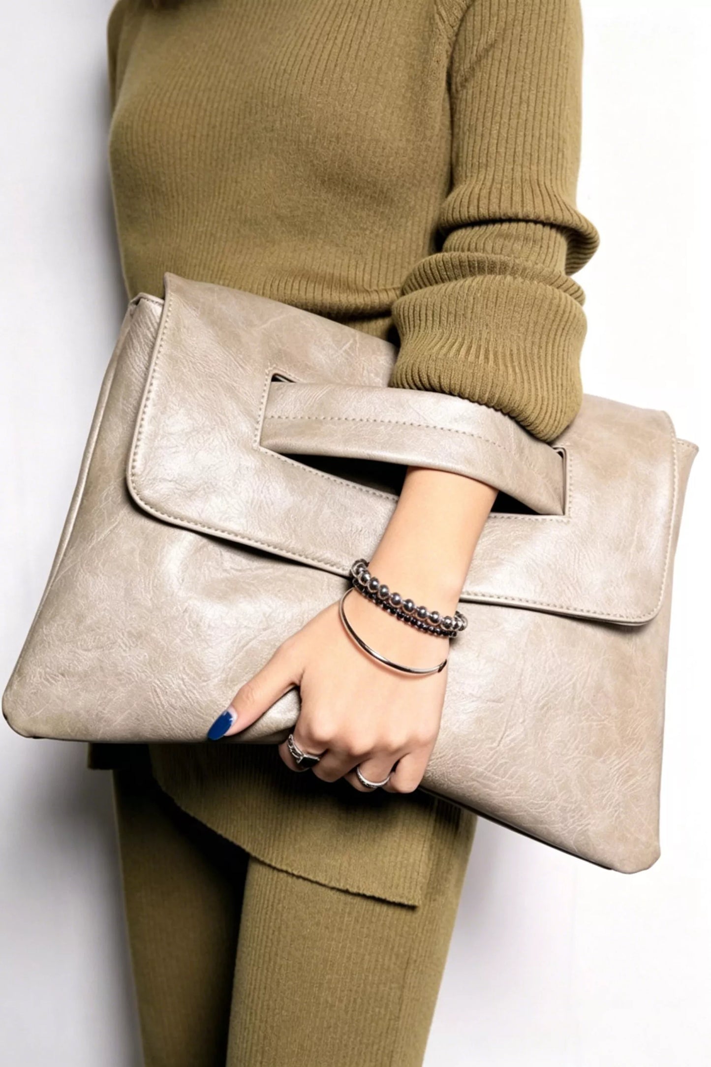 Vintage style envelope clutch handbag by Trendsi, featuring a sleek design and classic envelope silhouette in elegant materials.