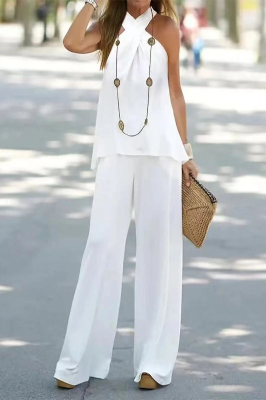 Trendsi halter top and wide-leg pants set displayed on a model, featuring a stylish matching outfit with a modern, chic look.