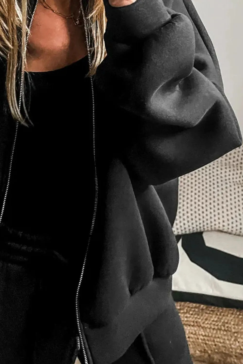 Trendsi zip-up long sleeve top and matching pants set, casual loungewear with a comfortable fit, shown in a sleek black color.