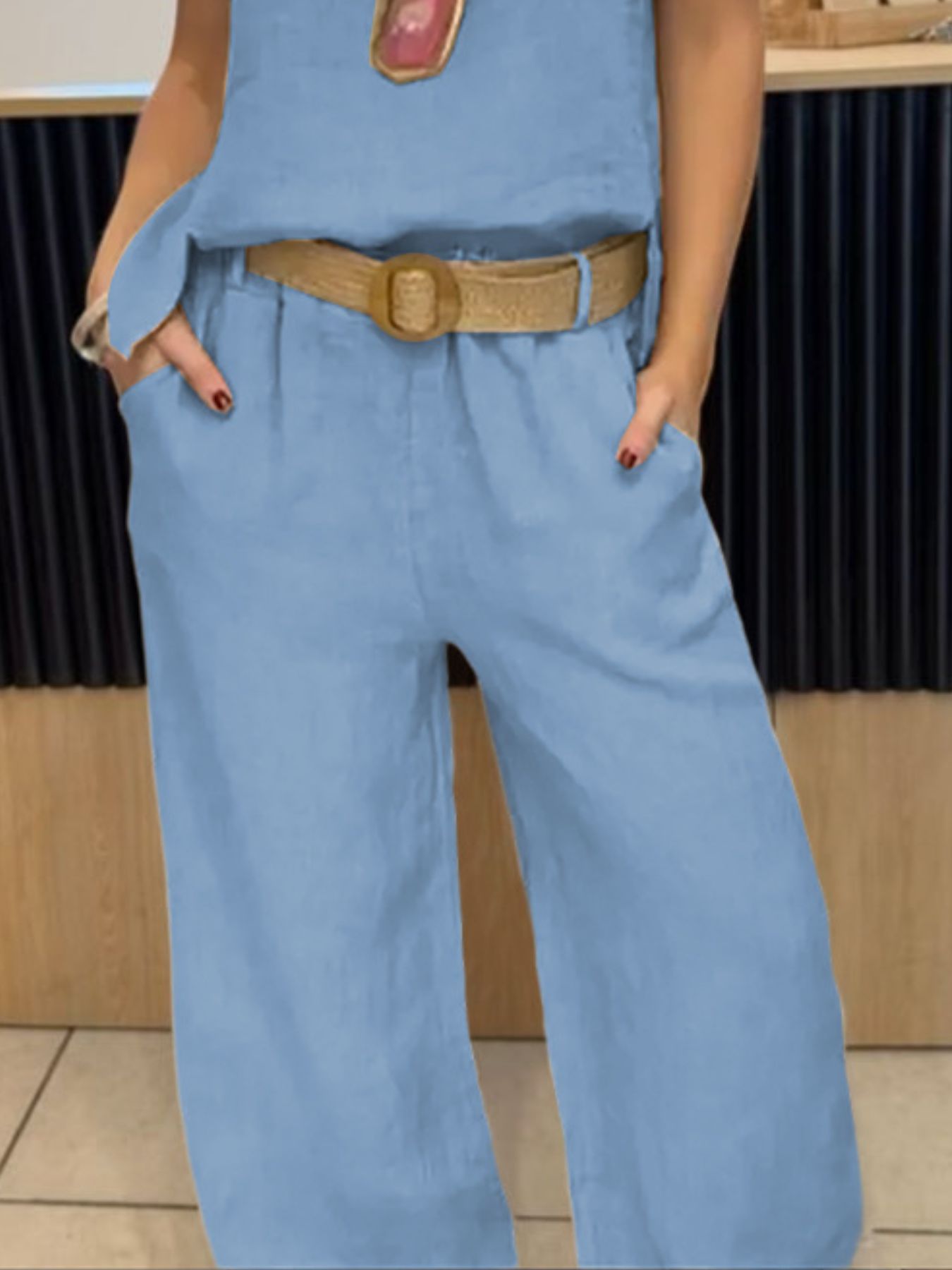Casual round neck tank top and matching pants set from Trendsi, comfortable loungewear in neutral fabric, front view.