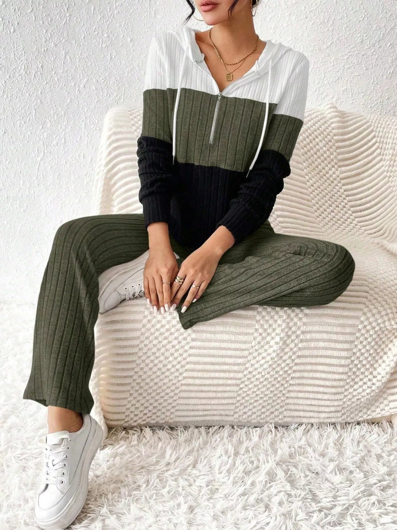 Color block half zip hooded top and matching pants set by Trendsi, featuring bold color blocks and casual athletic style.