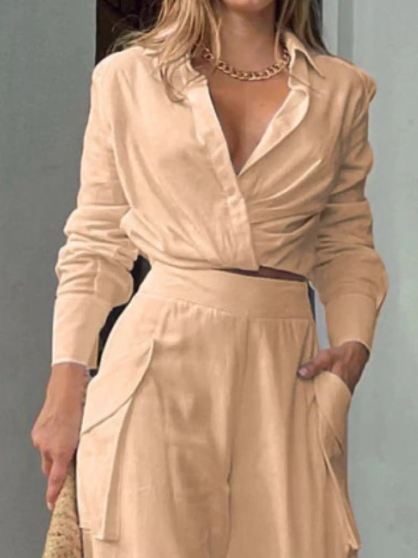 Button front shirt with patch pocket and wide-leg pants set from Trendsi, featuring a casual, stylish look in natural fabric.