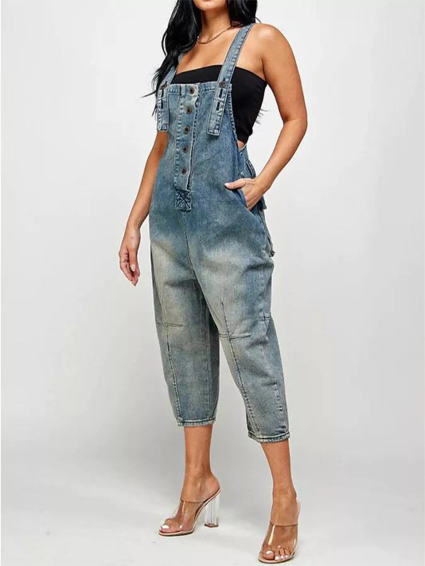 Denim button front overalls with pockets from Trendsi, featuring adjustable straps and a classic casual style.