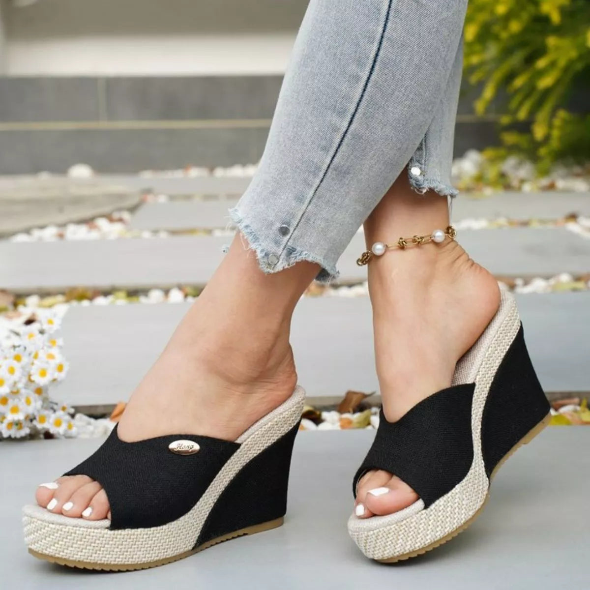 Open toe wedge sandals by Trendsi featuring a stylish design with comfortable straps and a chunky wedge heel.