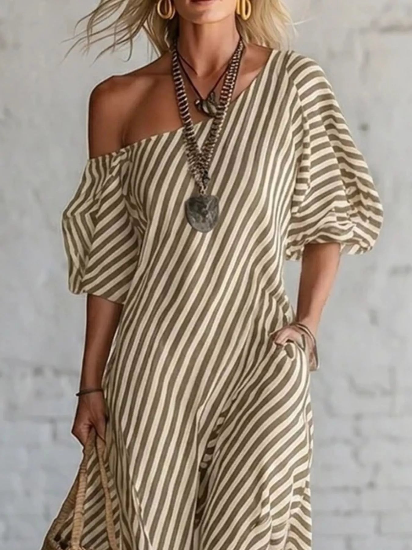 Striped one-shoulder maxi dress from Trendsi, flowing design with bold vertical stripes, perfect for summer or casual wear.