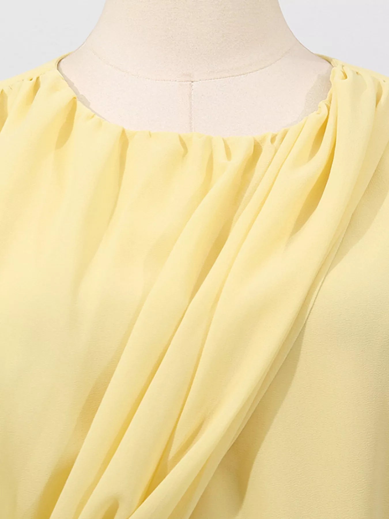 Yellow sleeveless ruched maxi dress with high slit, stylish and elegant, perfect for summer occasions.