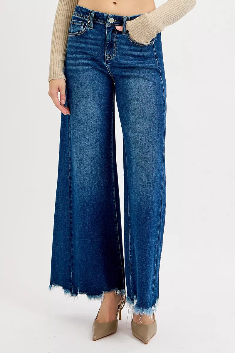 Frayed hem high-rise ankle wide jeans in denim, featuring a trendy distressed look and relaxed fit from Trendsi.