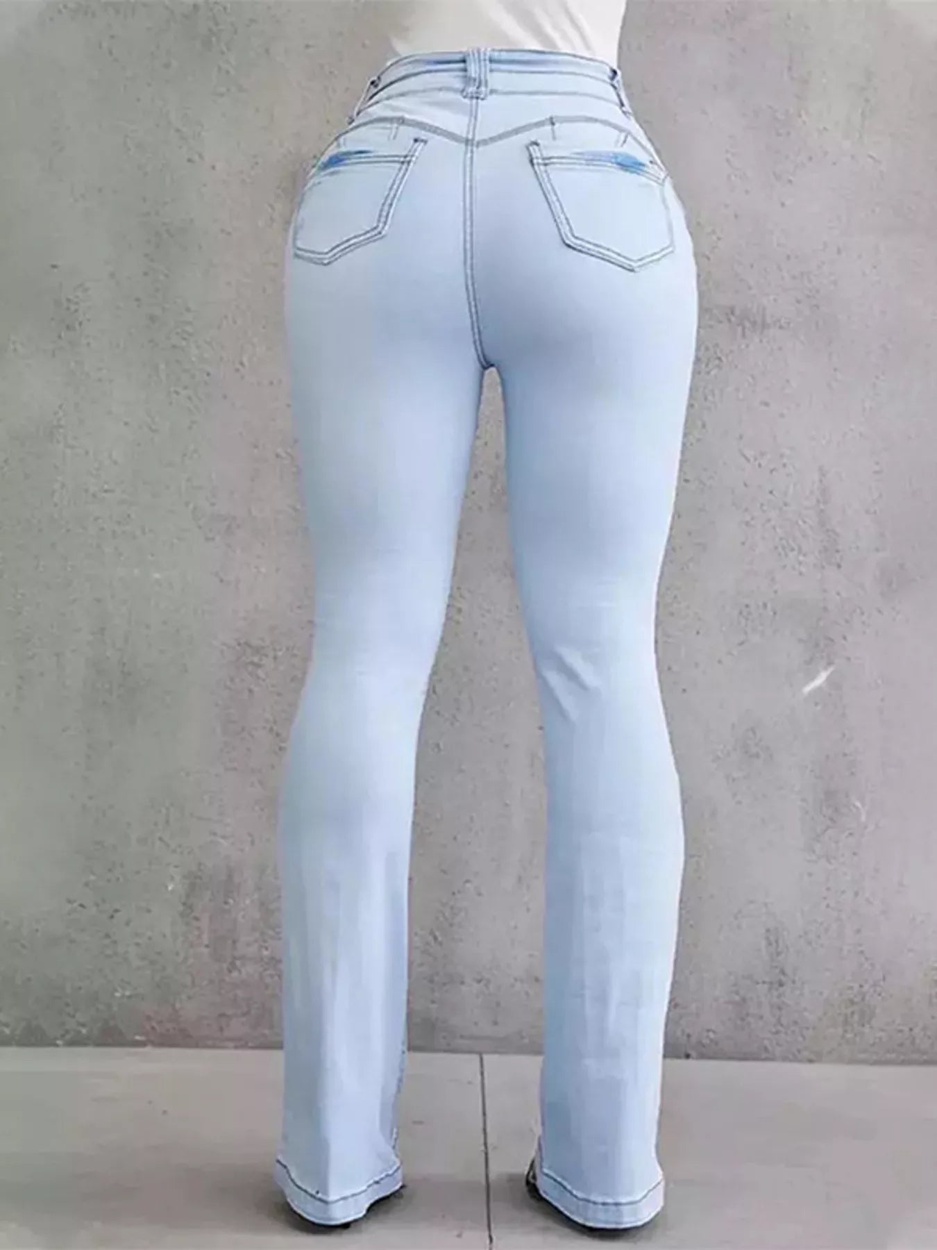 High-waisted flare jeans by Trendsi, showcasing the stylish bottoms with a fitted waist and flared leg design.