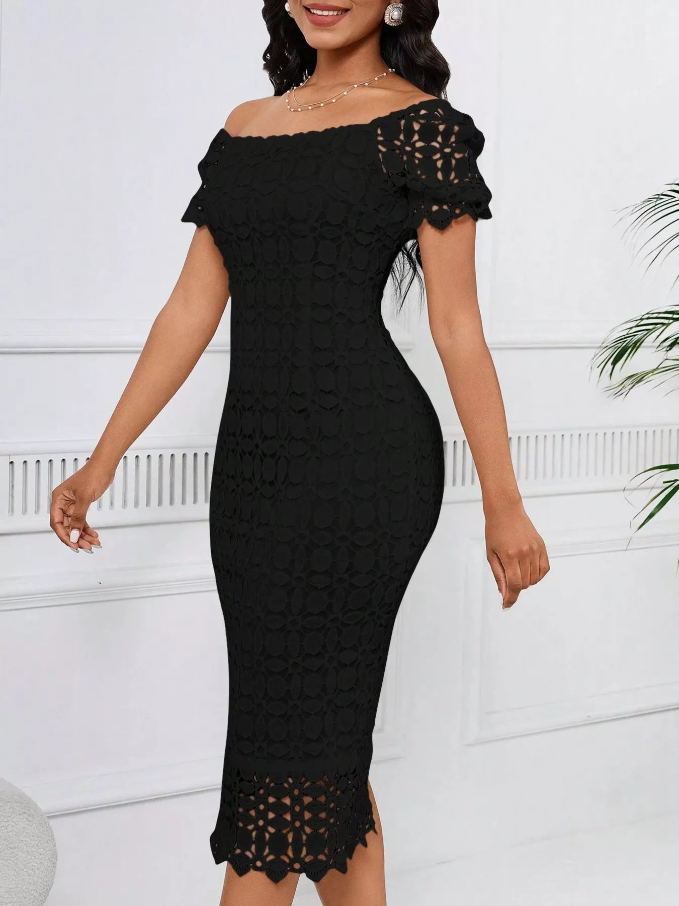 Lace short sleeve midi dress by Trendsi featuring a fitted bodice and flowing skirt, perfect for elegant occasions.