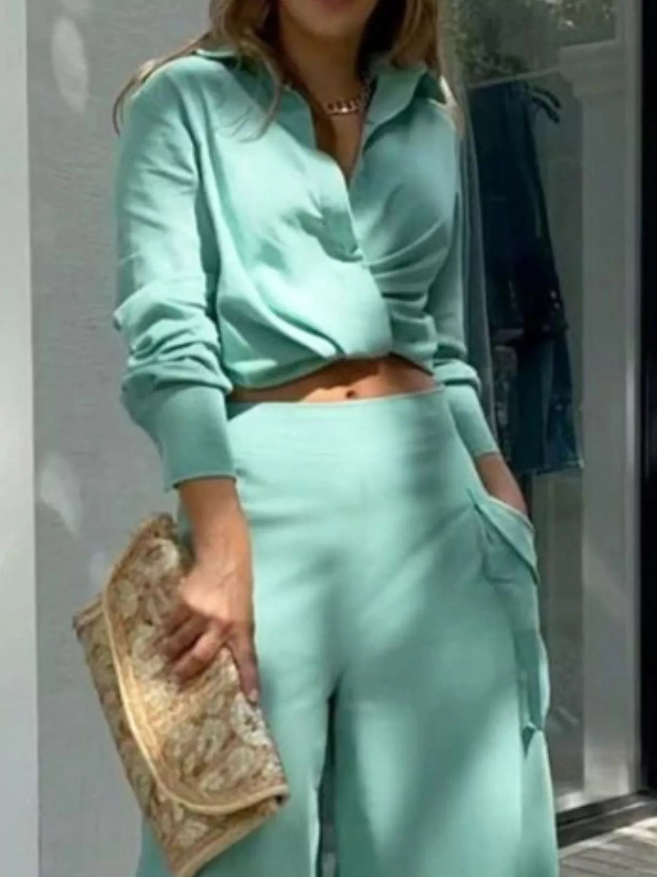 Trendsi button front shirt with collar and pocketed wide-leg pants set, featuring a stylish, casual look and comfortable fit.