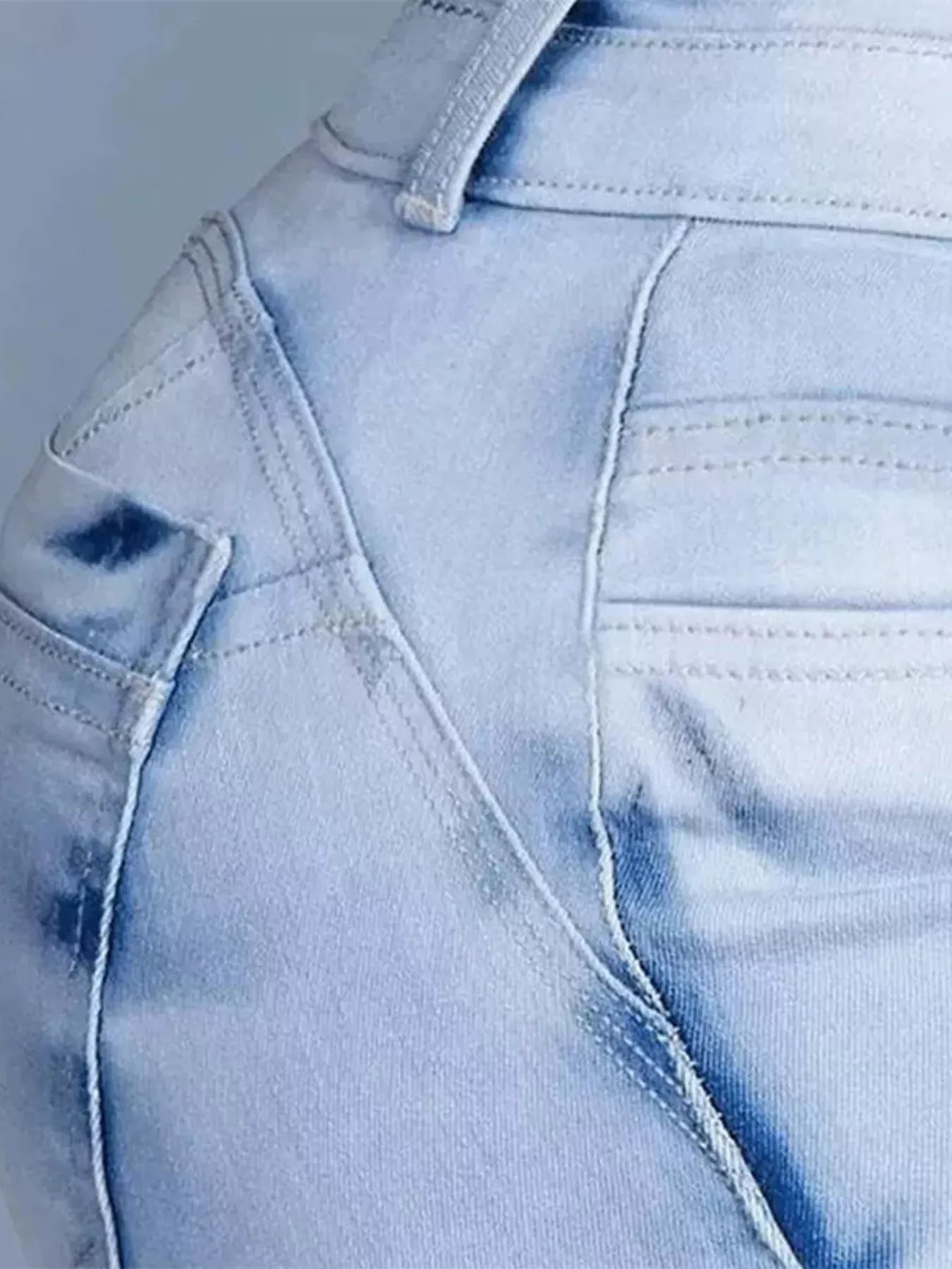 High-waisted flare jeans by Trendsi, featuring a classic denim look and fitted waist, styled as casual bottoms for women.