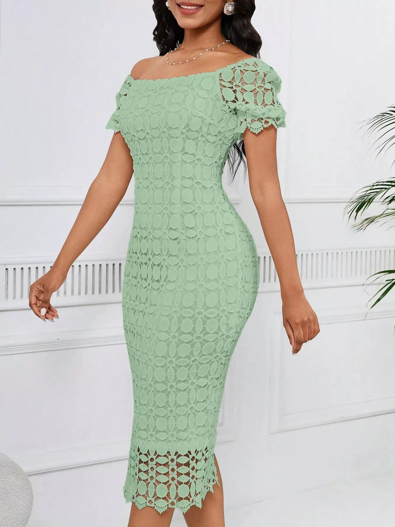 Lace short sleeve midi dress by Trendsi featuring delicate lace fabric and a fitted silhouette, perfect for elegant occasions.