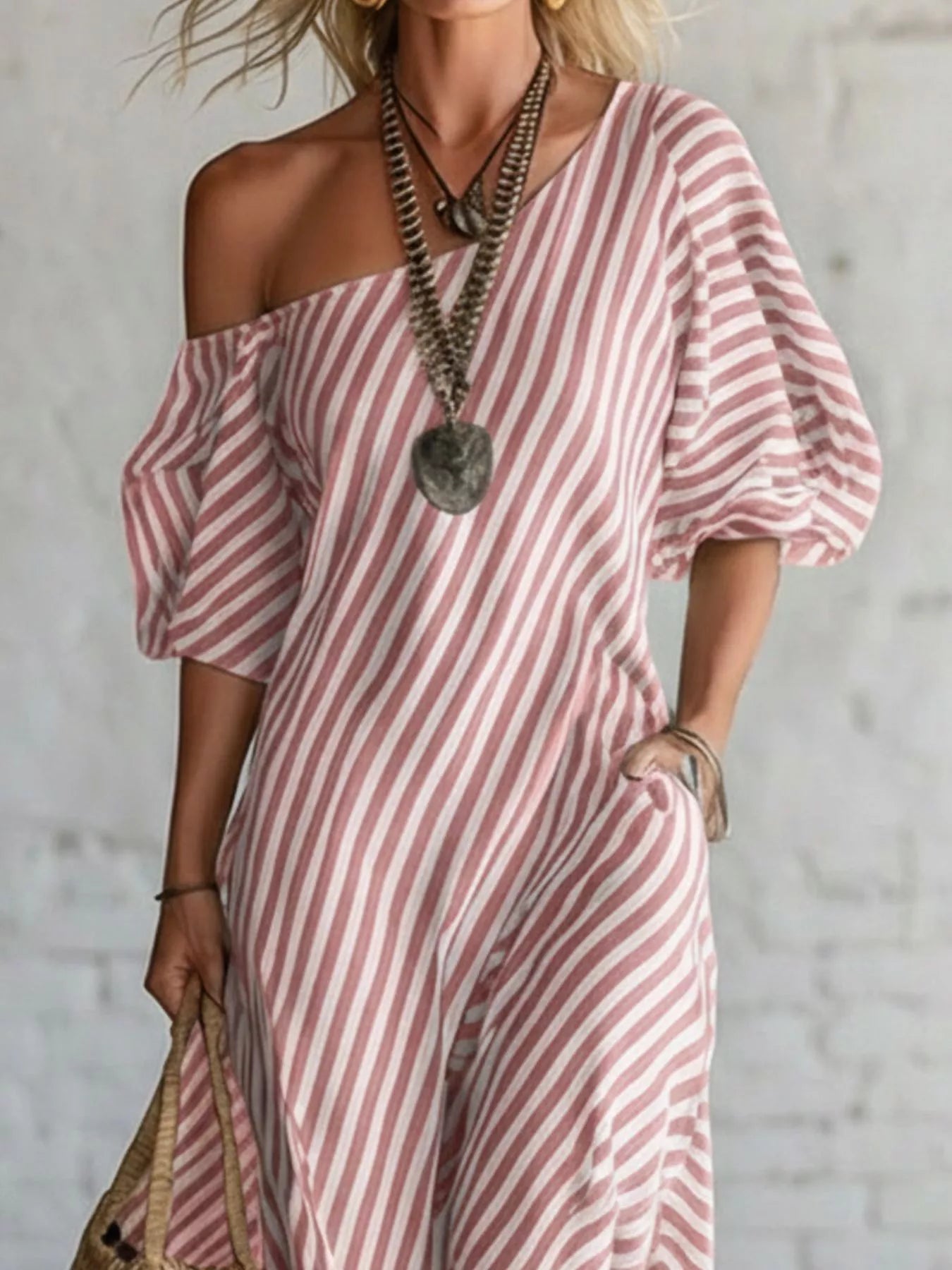 Striped one-shoulder maxi dress by Trendsi featuring a flowy design and bold horizontal stripes on lightweight fabric.