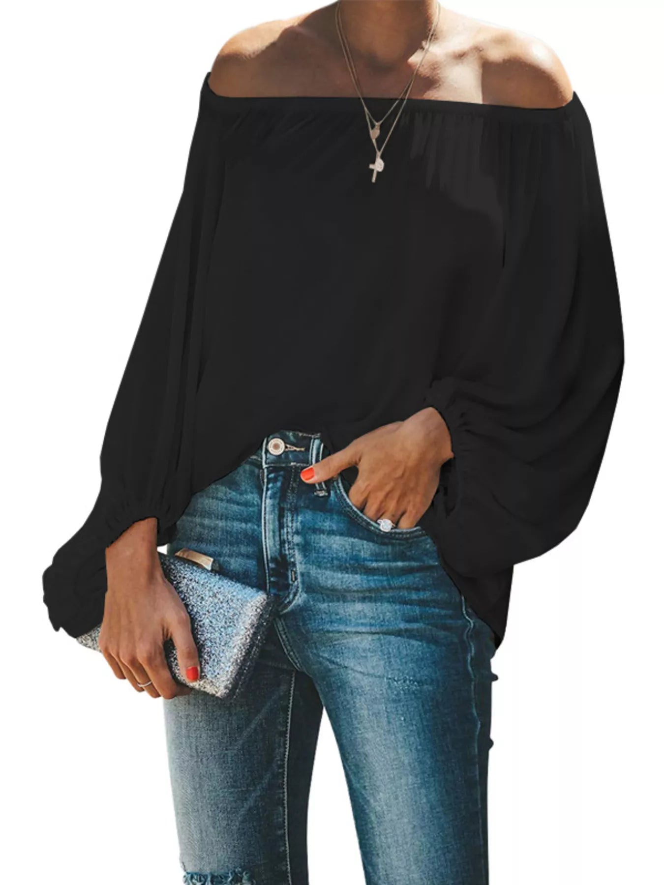 Off-shoulder balloon sleeve blouse from Trendsi, featuring a stylish neckline and voluminous sleeves, perfect for trendy casual wear.