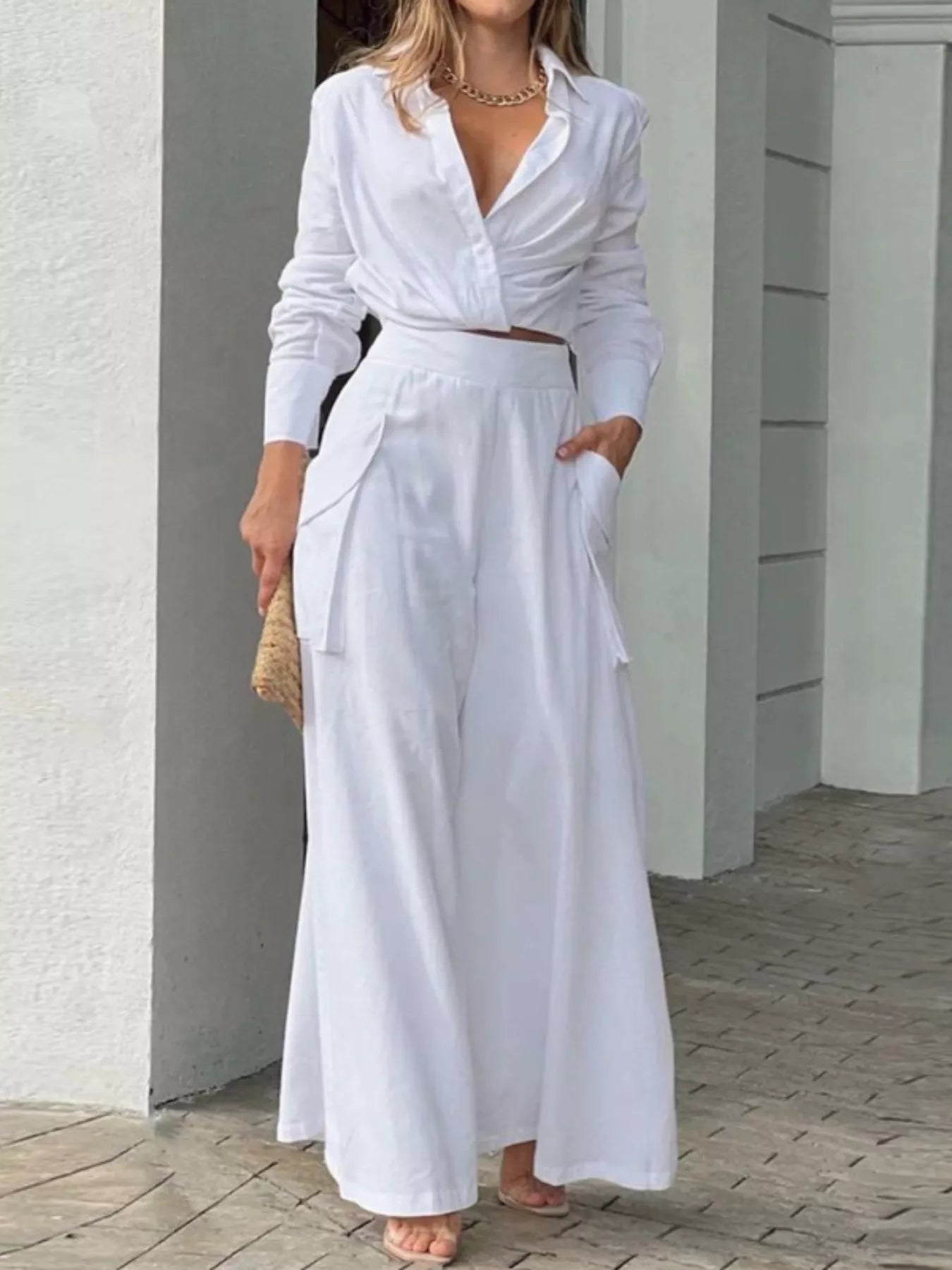 Button front shirt and pocketed wide-leg pants set by Trendsi, featuring a stylish coordinated outfit with a relaxed fit.
