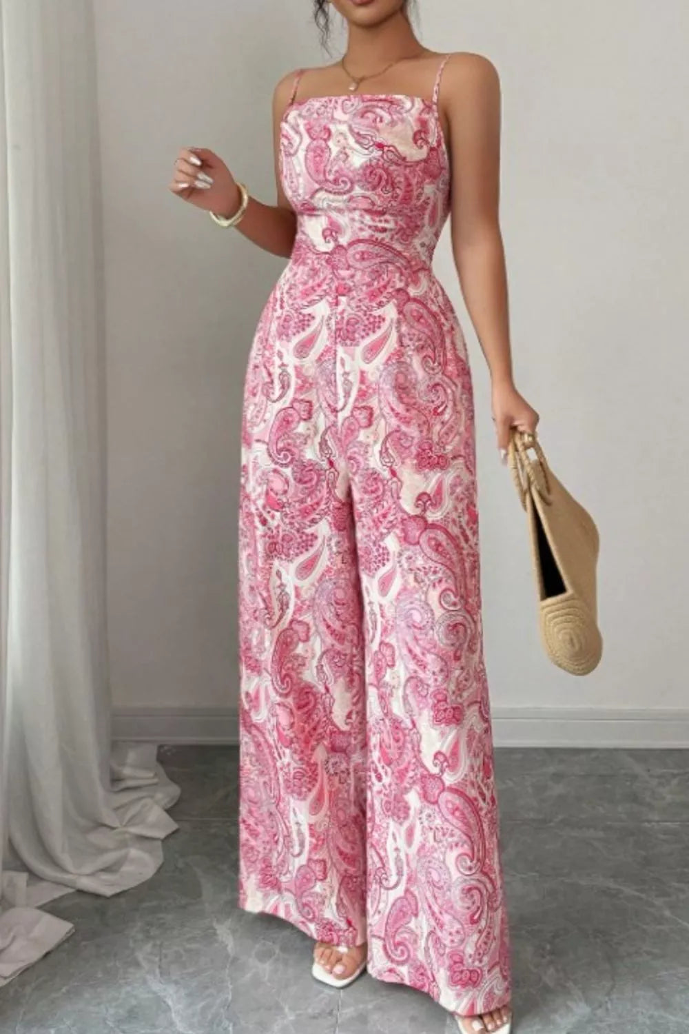 Pink Paisley Wide Leg Jumpsuit by Trendsi featuring a flowy fit and bold paisley pattern perfect for casual or dressy occasions.