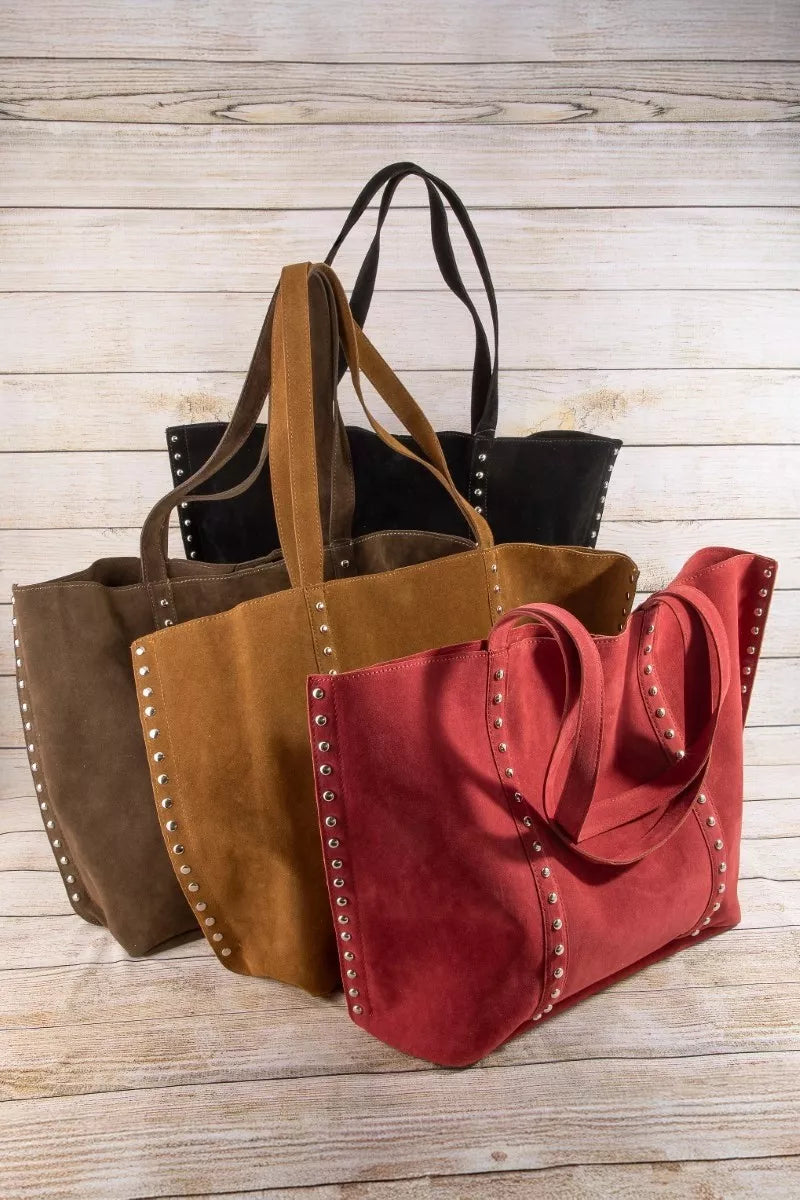 Large tote bag with studded trim from Toshe Women's Fashions, featuring a spacious design and stylish details in black.